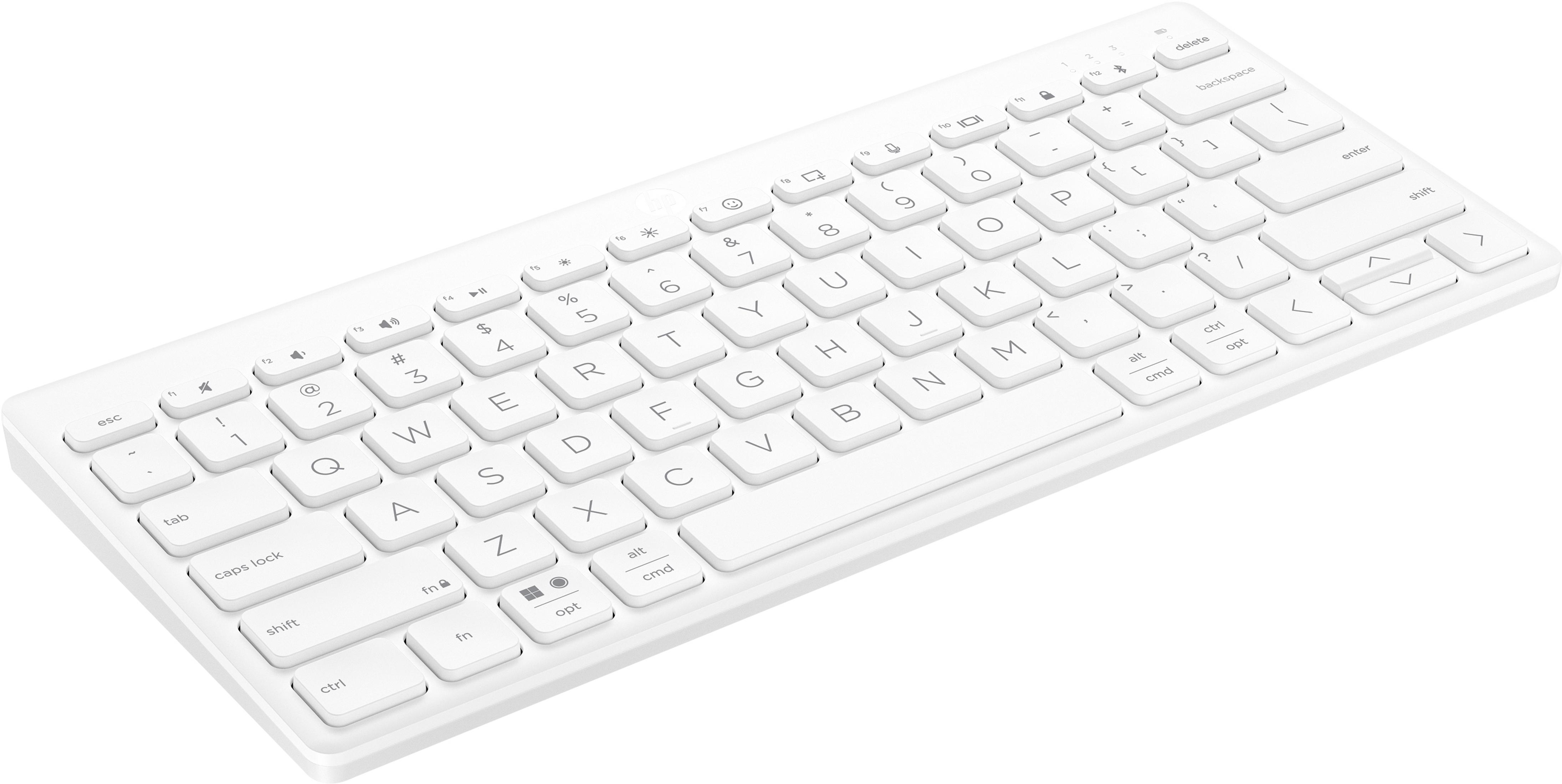 Eine weiße Computertastatur mit vielen Tasten. Flaches und sauberes Design.