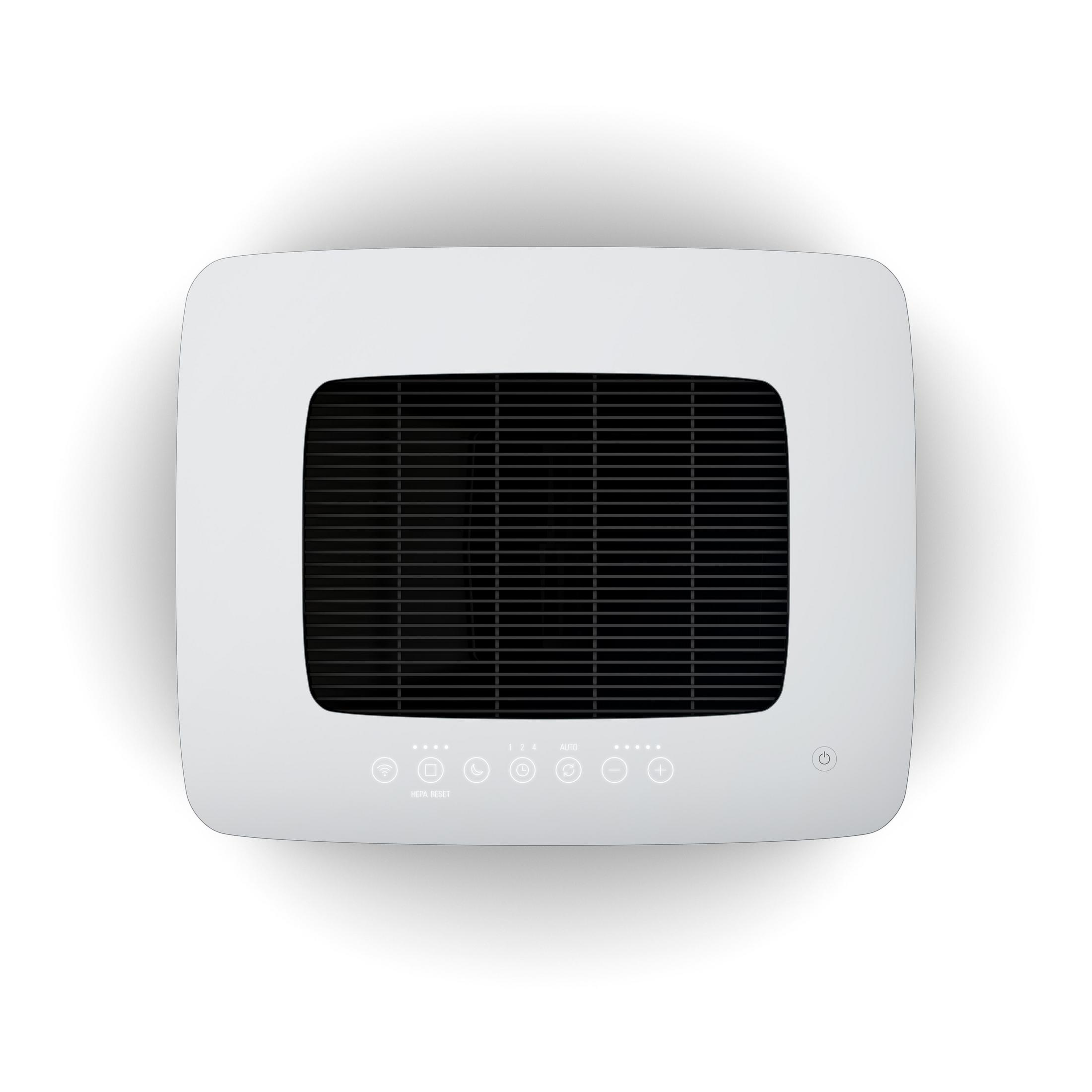 White air purifier. Top view with control buttons and filter visible.