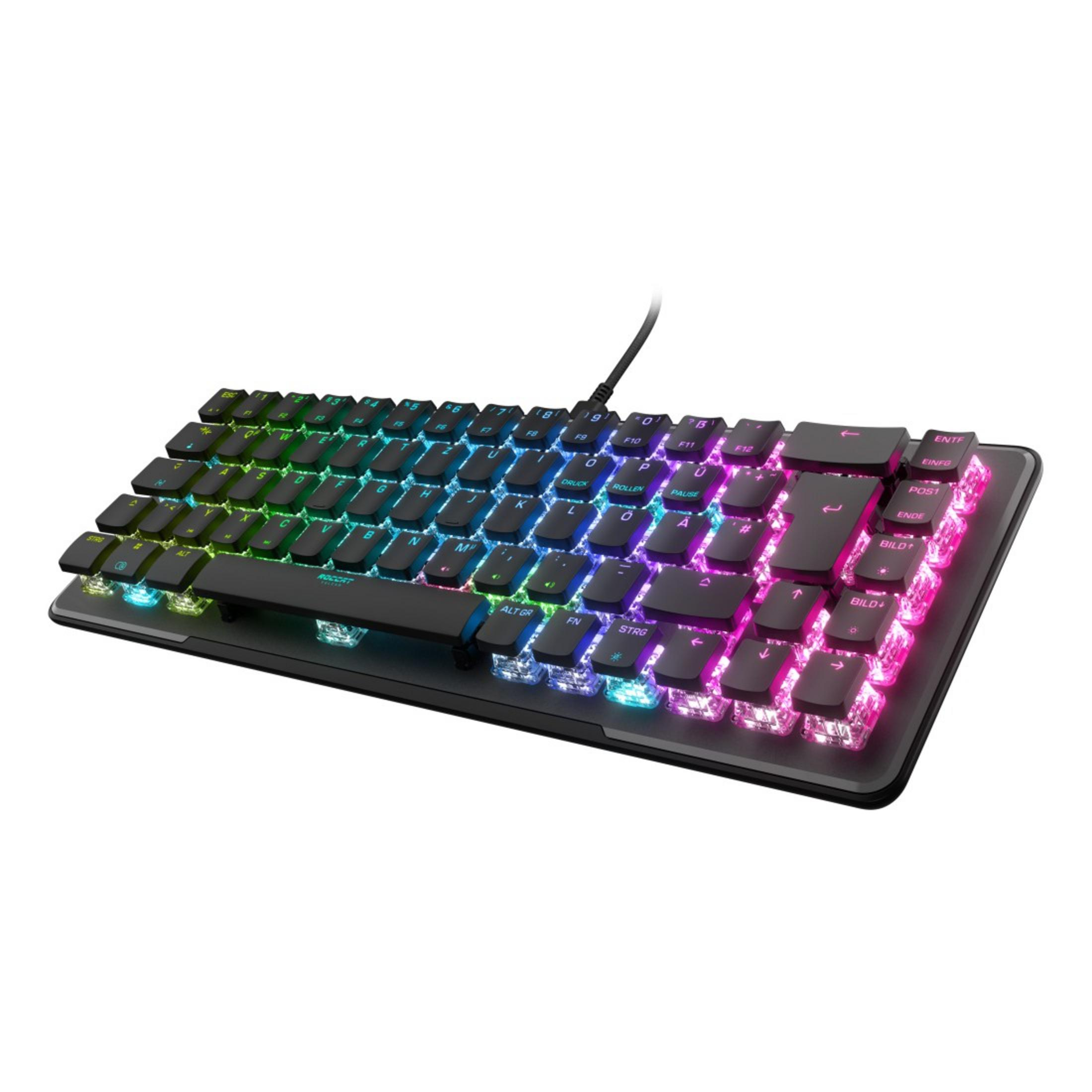 Tastiera nera con tasti LED arcobaleno. Un cavo nero è collegato. La tastiera è su una superficie chiara.