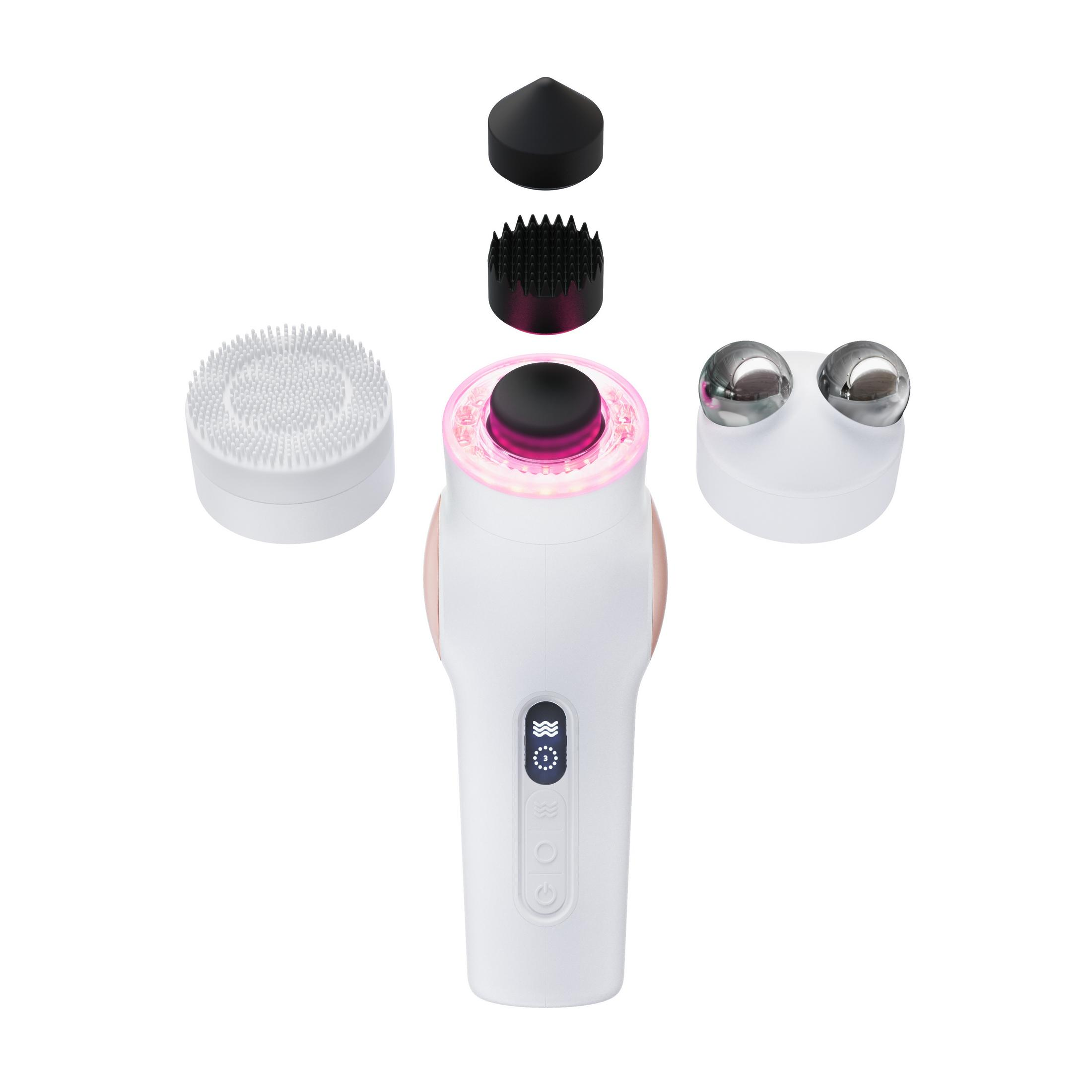 Dispositivo facial con cabezales intercambiables, cuerpo blanco y rosa, y varios accesorios.