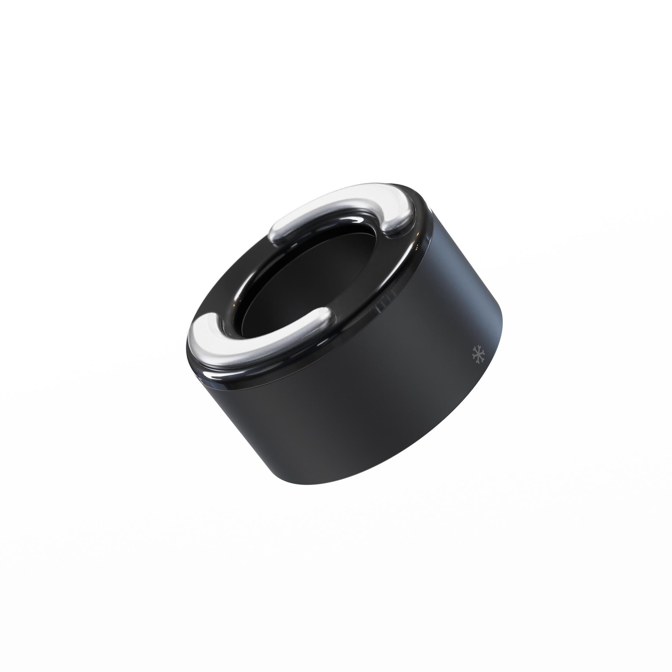 Un dispositivo negro con un anillo de luz blanco, probablemente un difusor o humidificador, sobre fondo blanco.