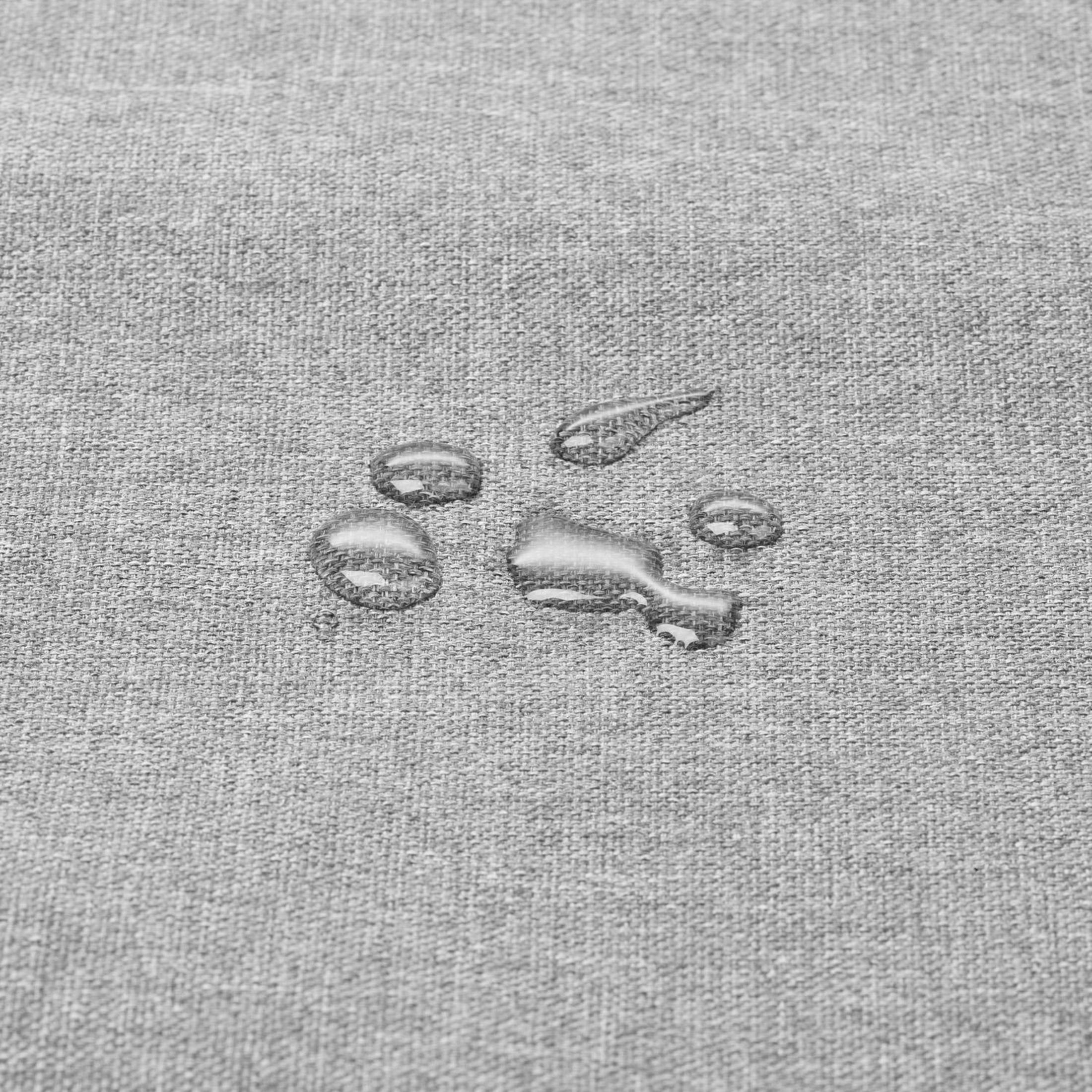 Szara tkanina z kroplami wody.