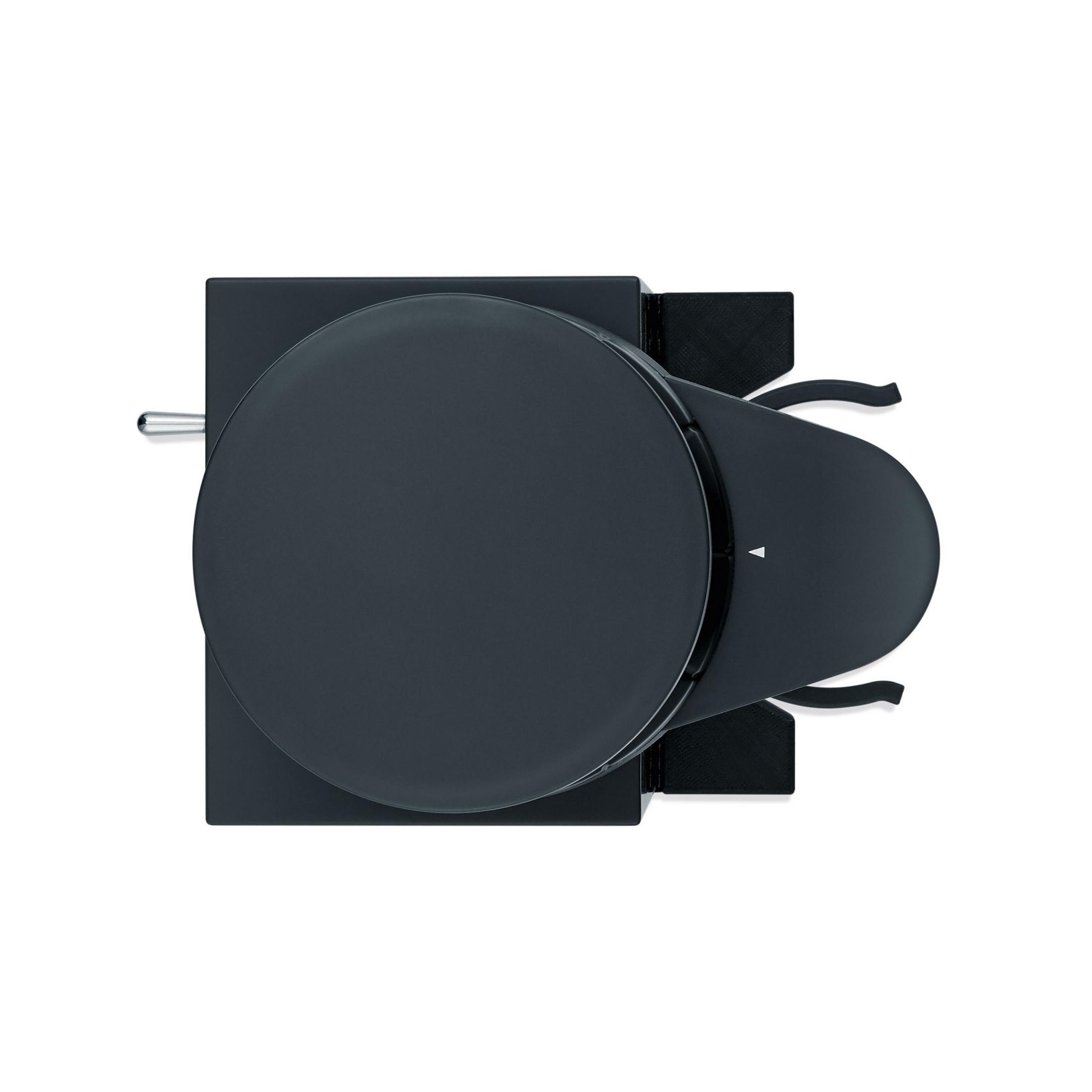 Ciemnoszara maszyna do kawy, widok z góry. Okrągła płyta z uchwytem i kwadratową podstawą.