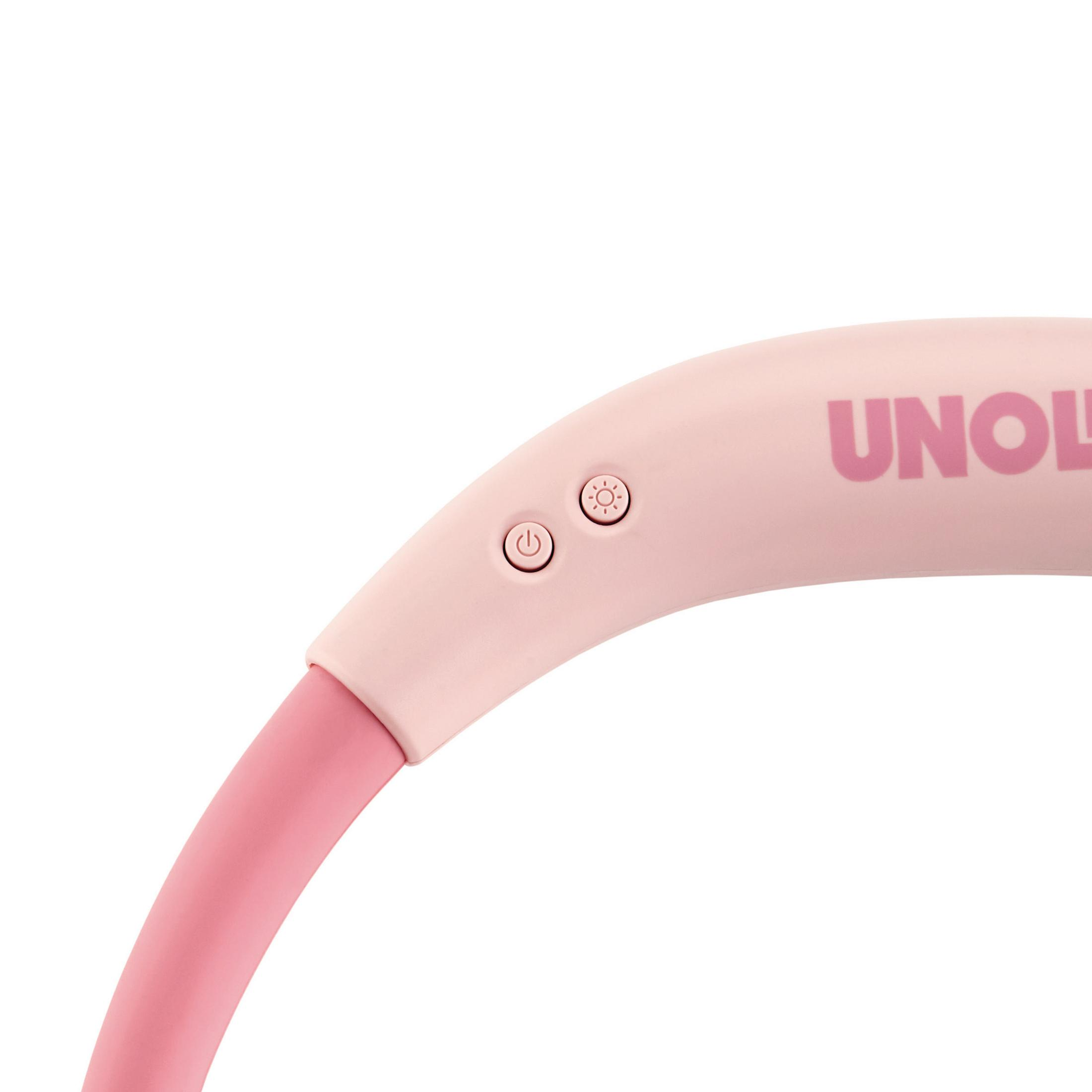 Zbliżenie na różową opaskę na głowę z dwoma przyciskami sterowania. Na opasce napis UNOID.