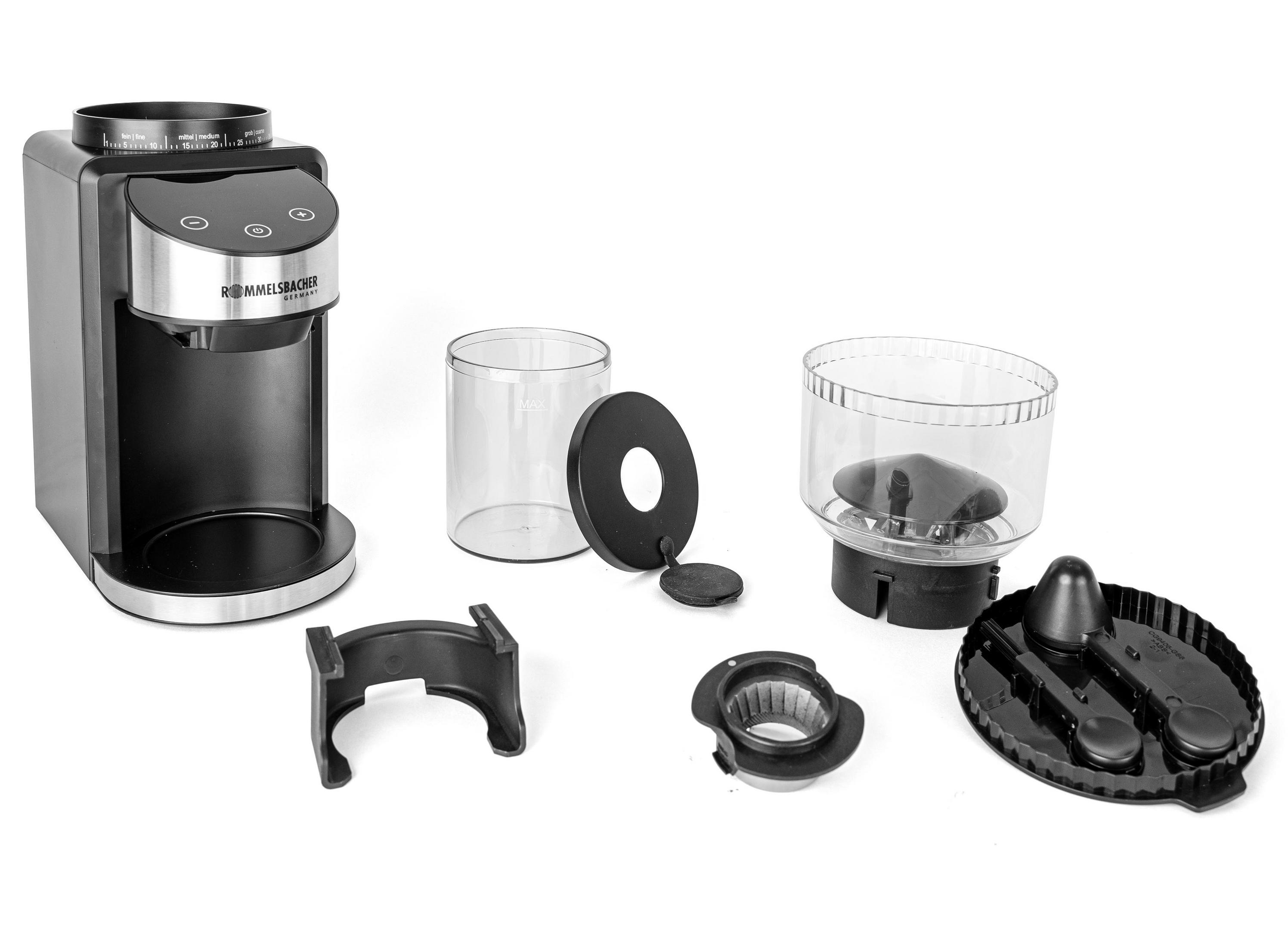 Rozłożony młynek do kawy. Części obejmują młynek, pojemnik, pokrywę i inne elementy.