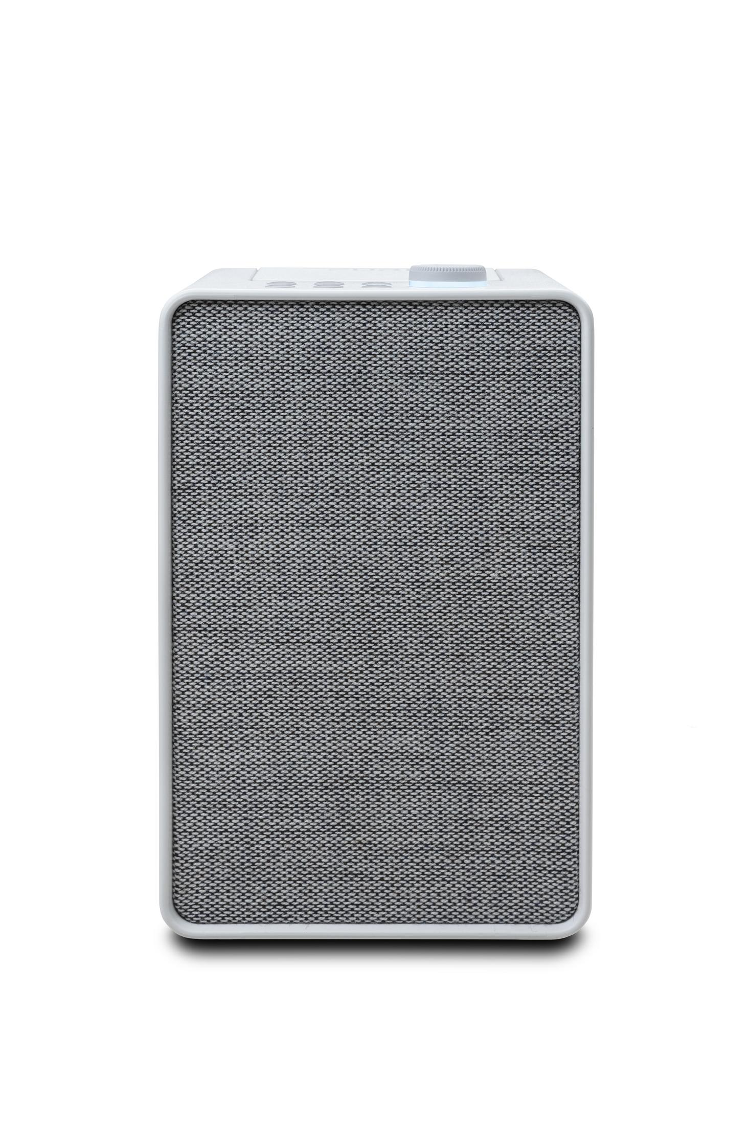 Altavoz rectangular blanco con una rejilla metálica frontal.