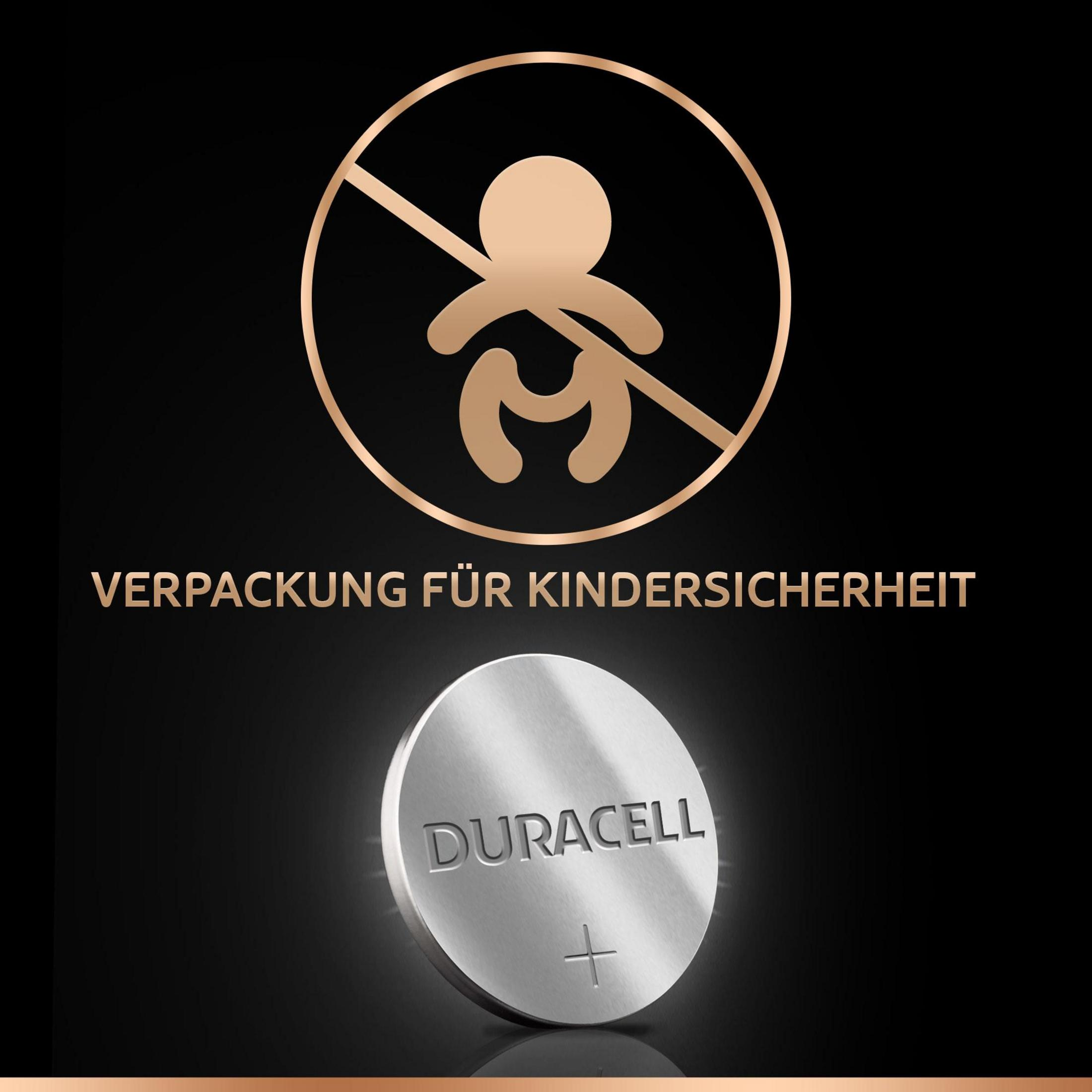 Ein schwarzer Hintergrund mit einer Duracell-Batterie und einem Kindersicherheitssymbol mit Text.