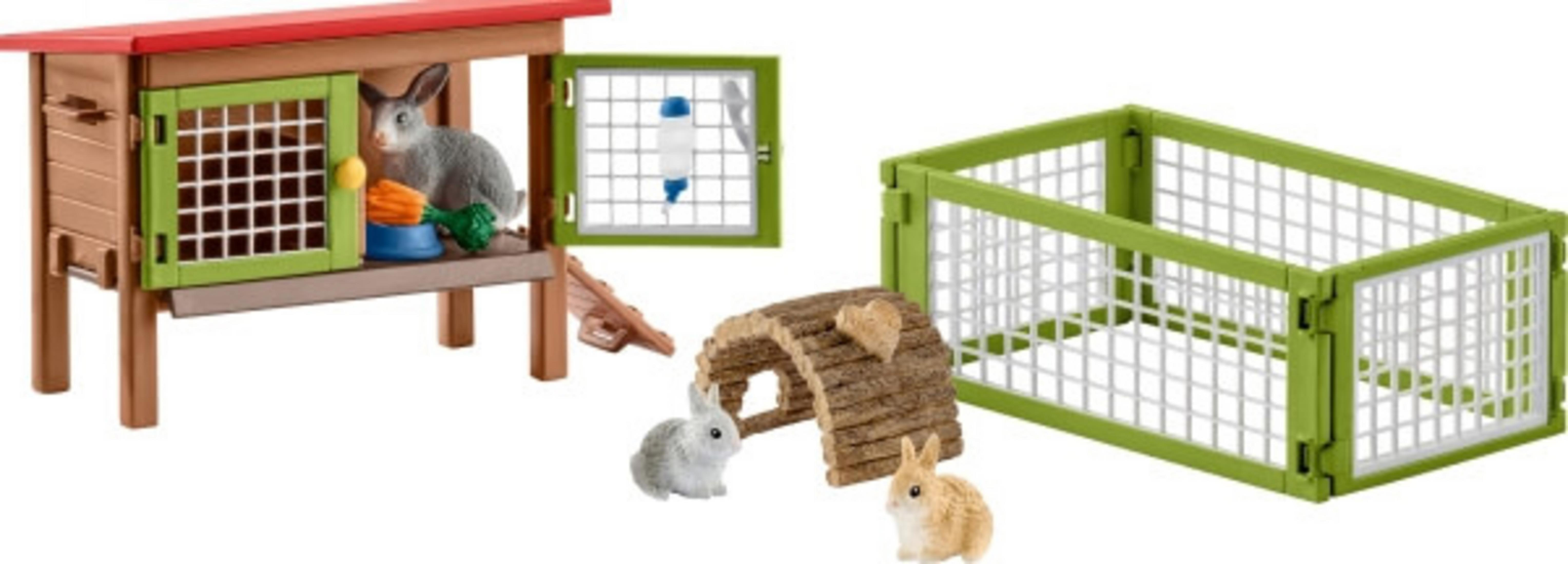 Zabawkowy królik i akcesoria. Zawiera klatkę, wybieg, tunel i zabawki królików.