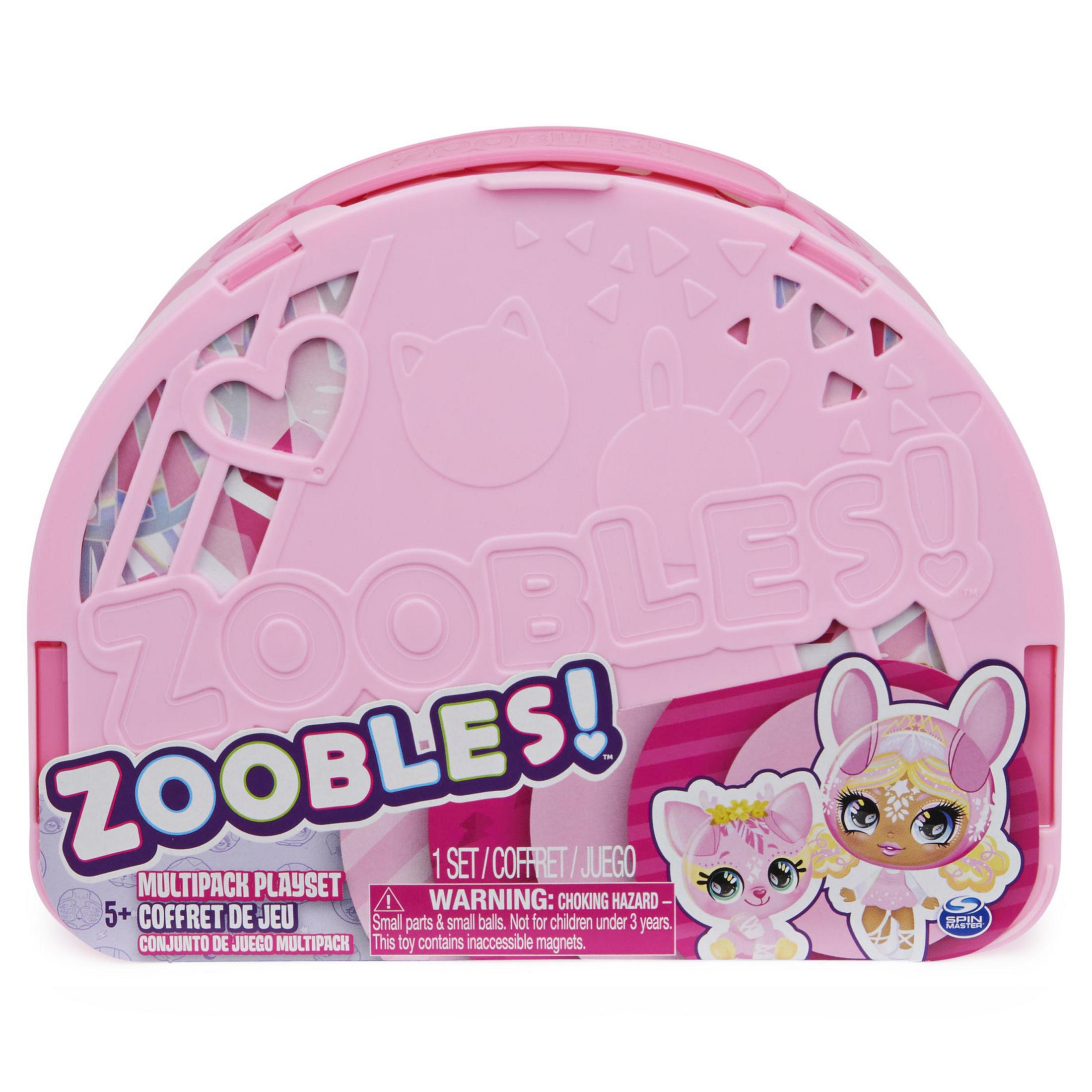 Rosa Zoobles-Spielset-Box mit Figuren. Es hat den Text "ZOOBLES!". Warnhinweise sind sichtbar.
