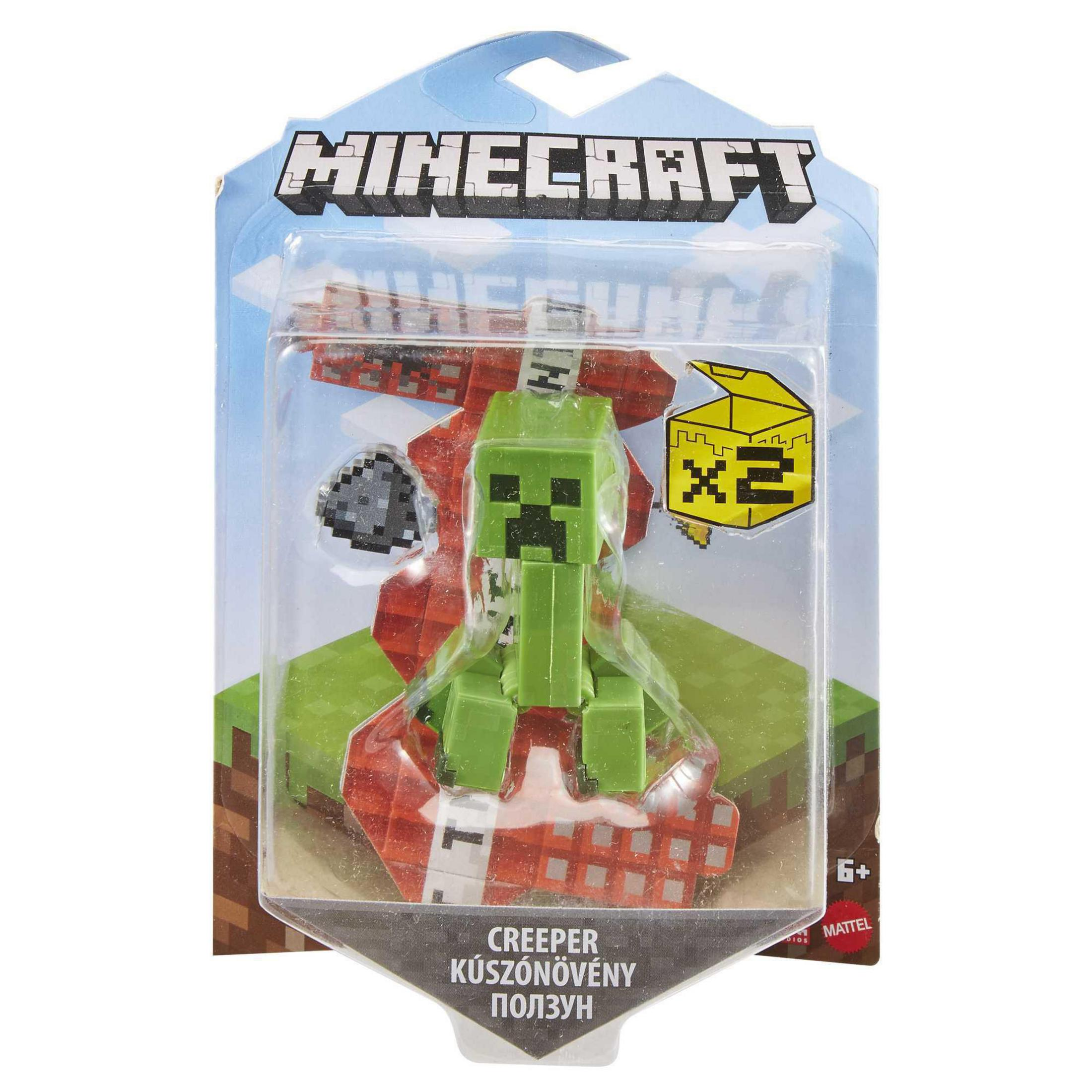 Minecraft Creeper Spielzeug in einer Verpackung. Enthält eine grüne Creeper-Figur und einen pixeligen Hintergrund.