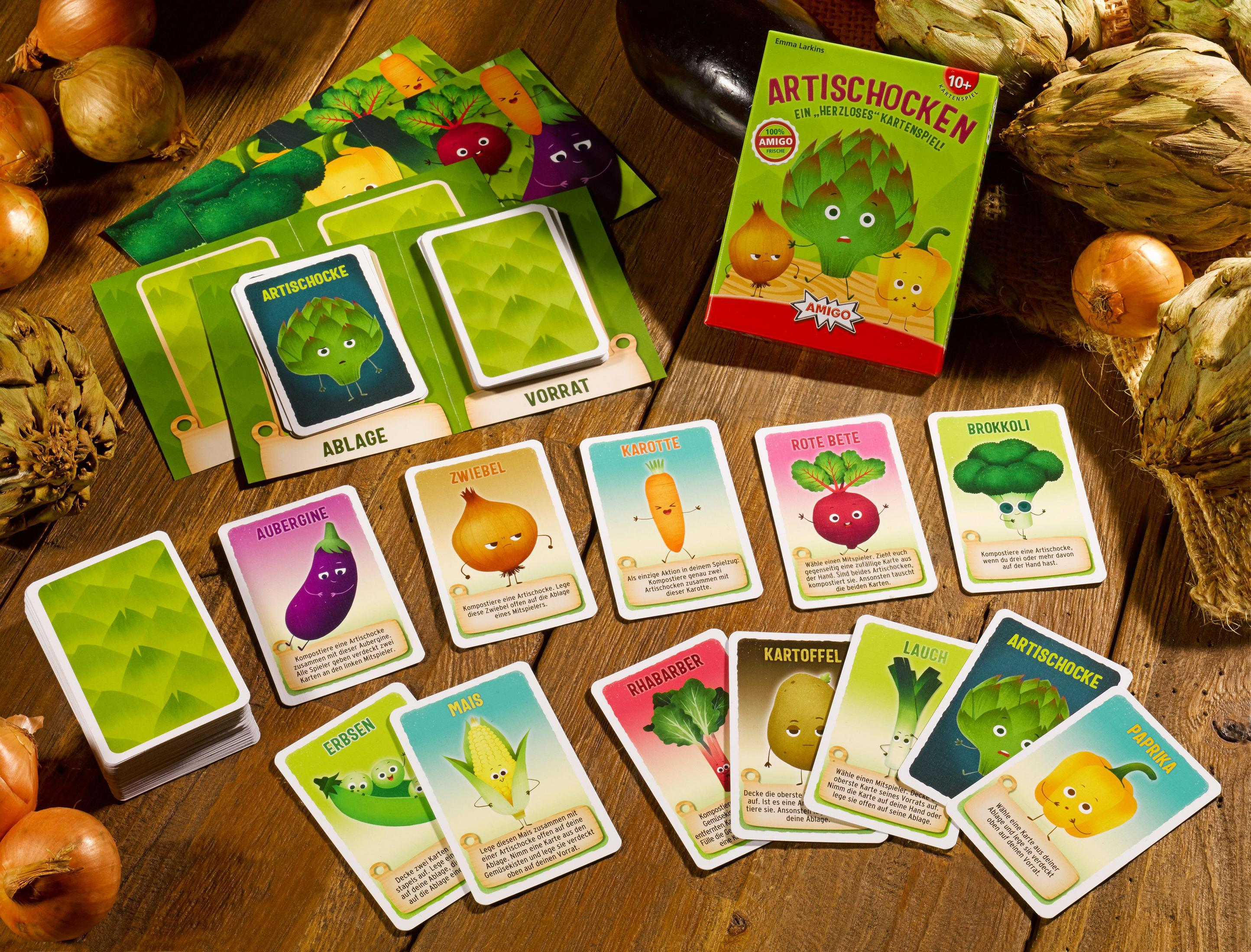 Un jeu de société avec des cartes de légumes et une boîte d'artichauts est présenté.