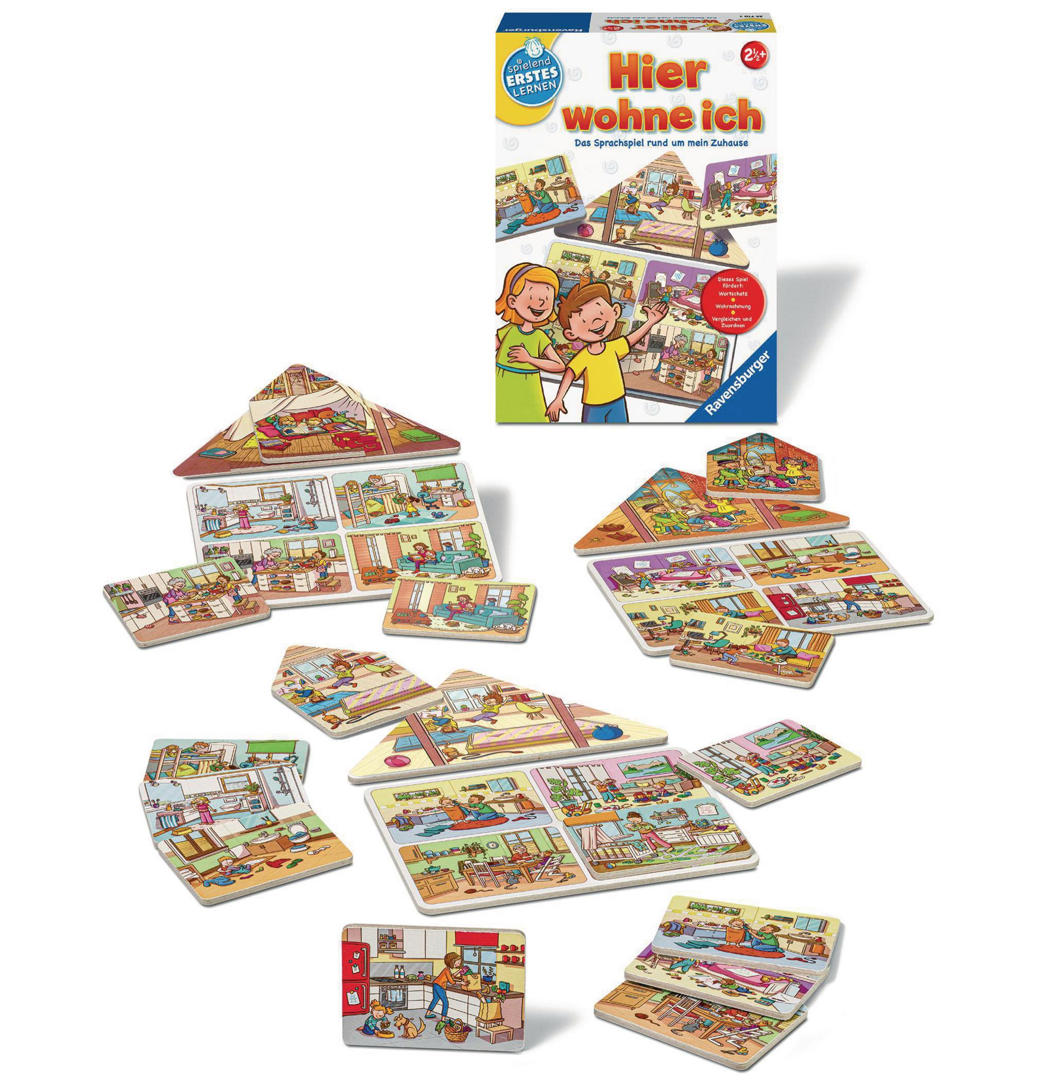 Puzzlespielbox mit Hausbildern. Verschiedene Puzzleteile verstreut.
