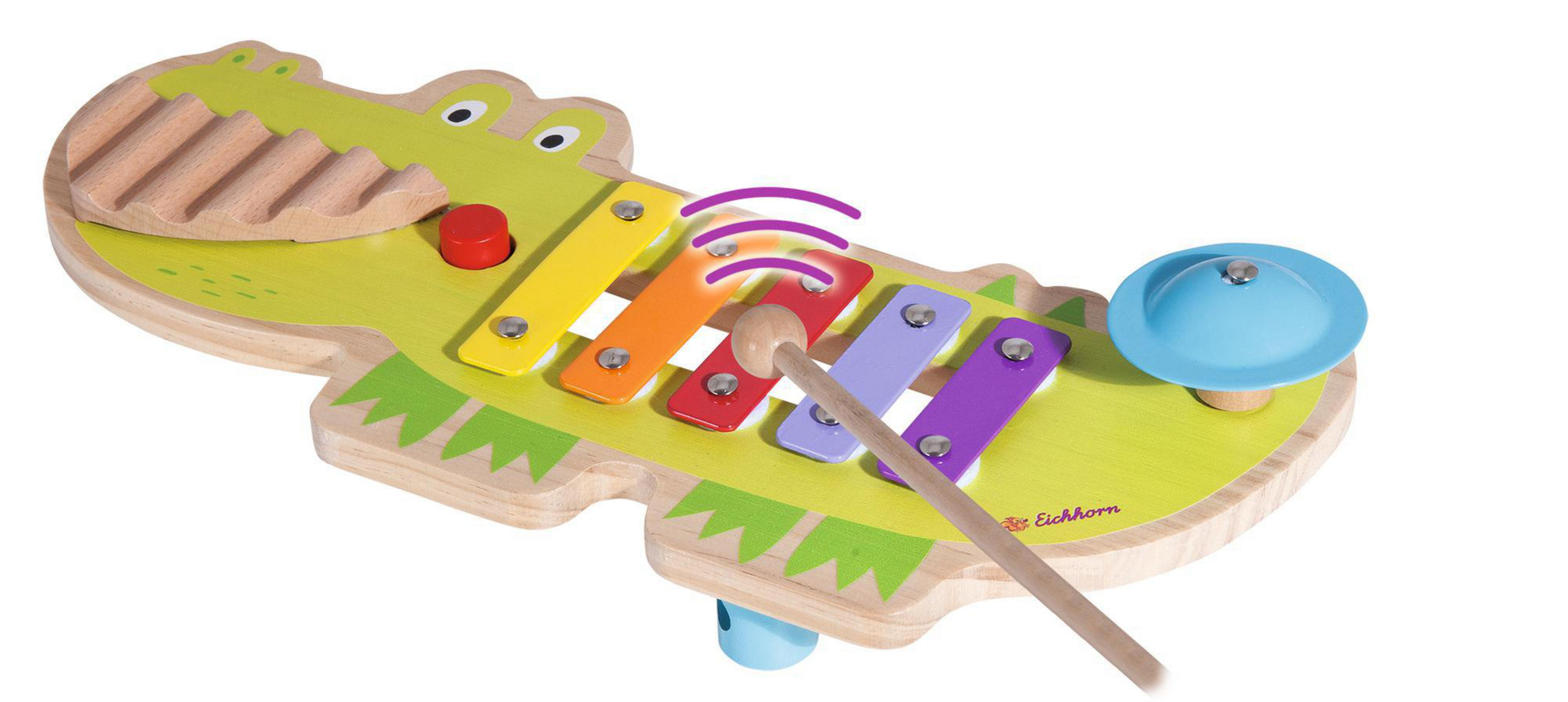 Ein hölzernes Xylophon in Form eines grünen Krokodils mit bunten Tasten und einem Schlägel.