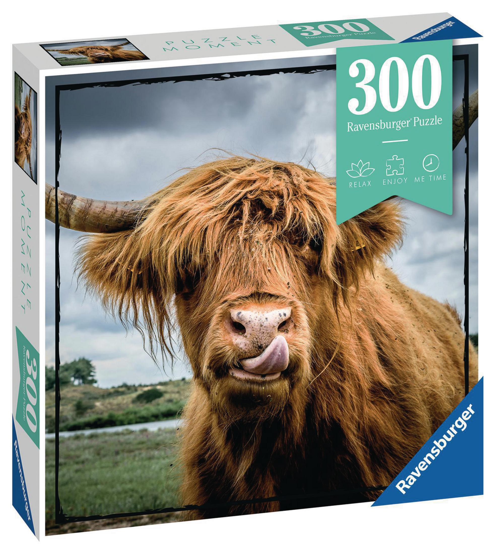 Eine Puzzledose mit einer Nahaufnahme einer Kuh, die die Zunge herausstreckt.