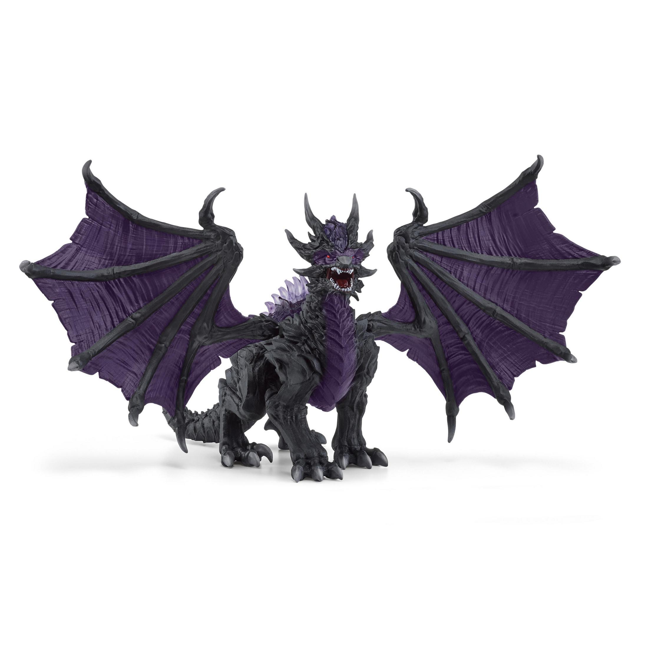 Giocattolo a forma di drago nero e viola con ali spiegate, in piedi su una superficie bianca.
