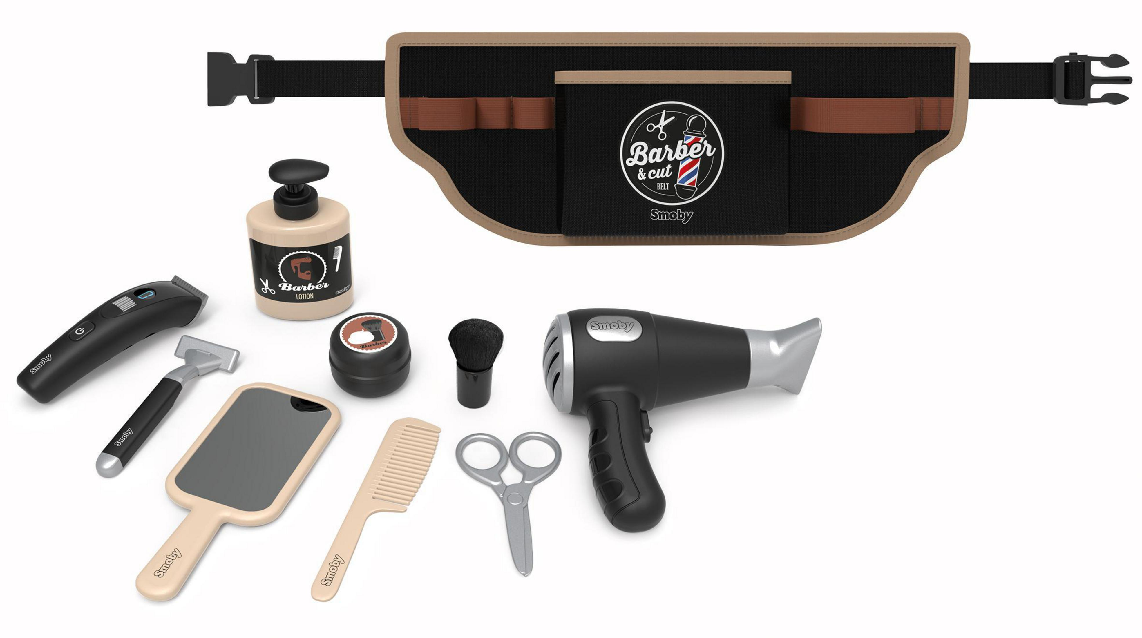 Ein Set mit Spielzeug-Friseurwerkzeugen, darunter Clipper, Rasierer, Spiegel, Kamm, Schere und Lotion.