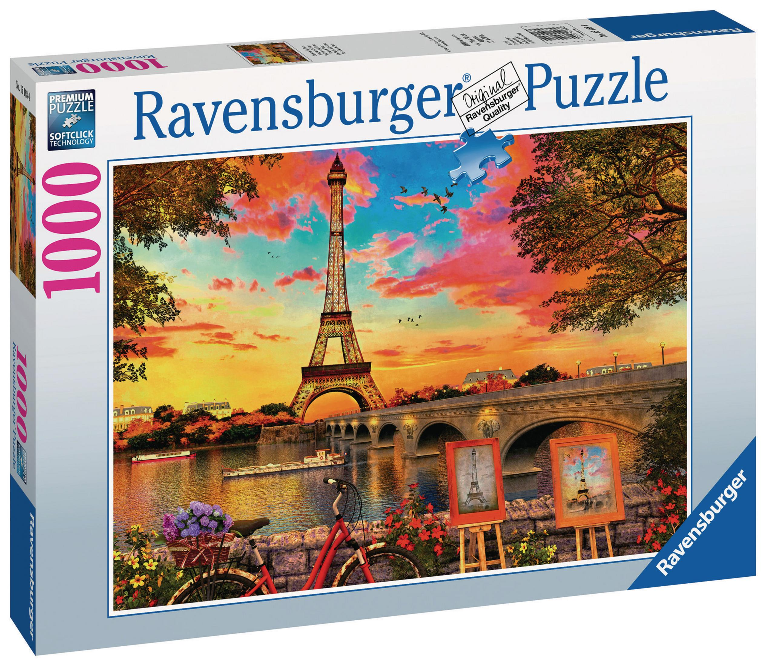 Ravensburger Puzzlebox: 1000 Teile. Eiffelturm und Paris-Szene bei Sonnenuntergang.