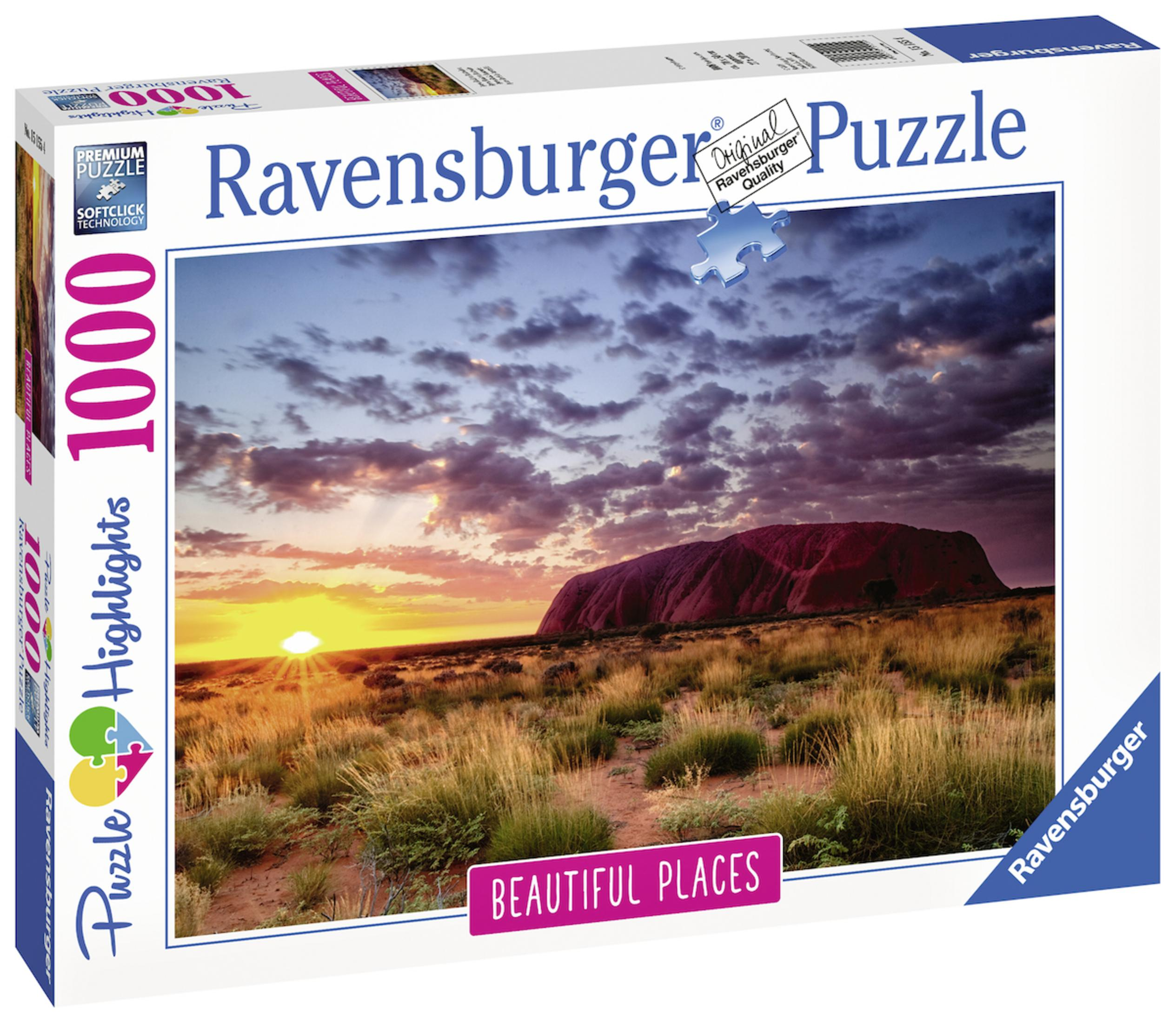 Pudełko puzzli Ravensburger 1000 elementów ze wschodem słońca nad Uluru i polem.