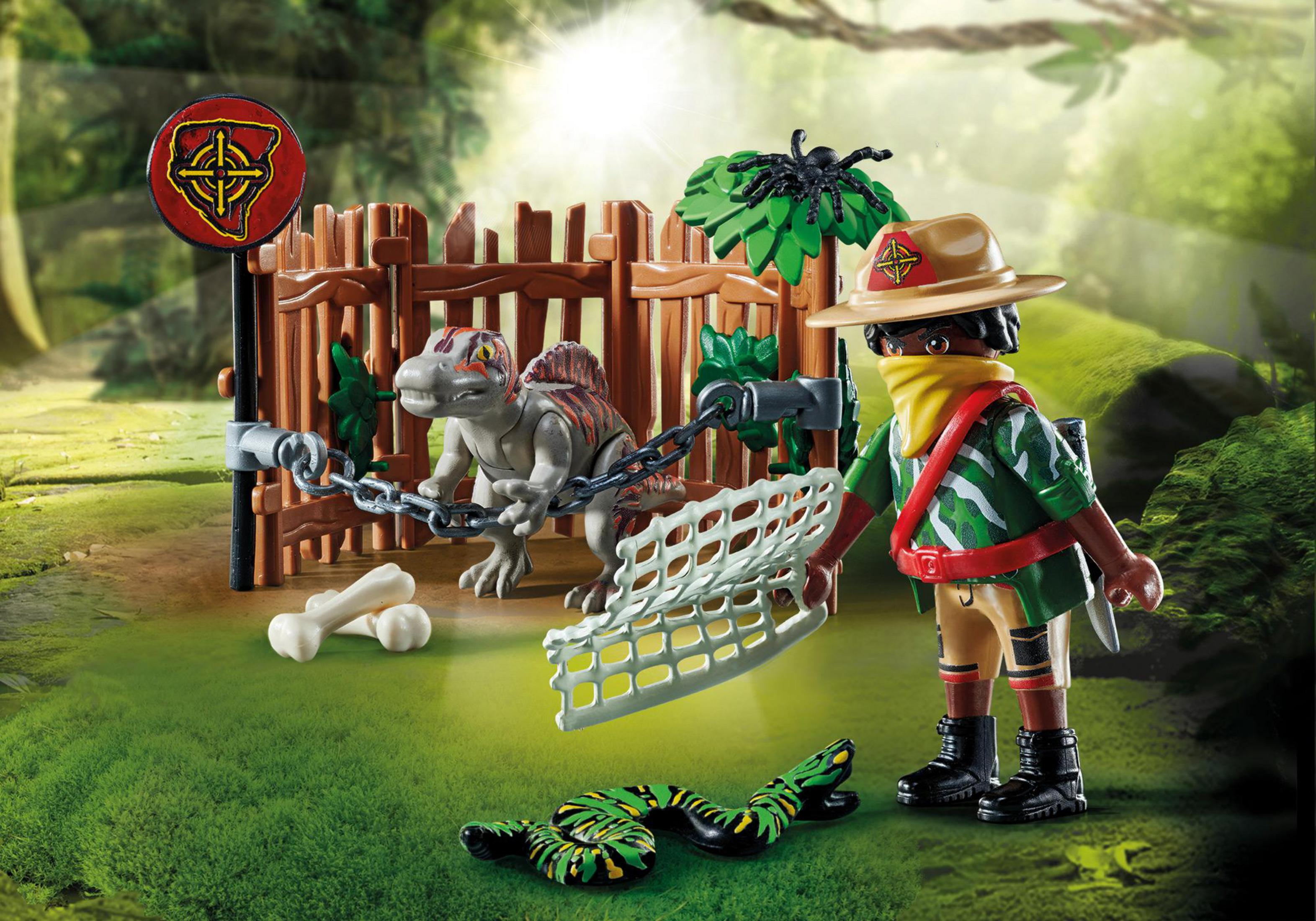 Playmobil-Szene: eine Person mit einem Dinosaurier in einer Dschungelumgebung mit Zaun.