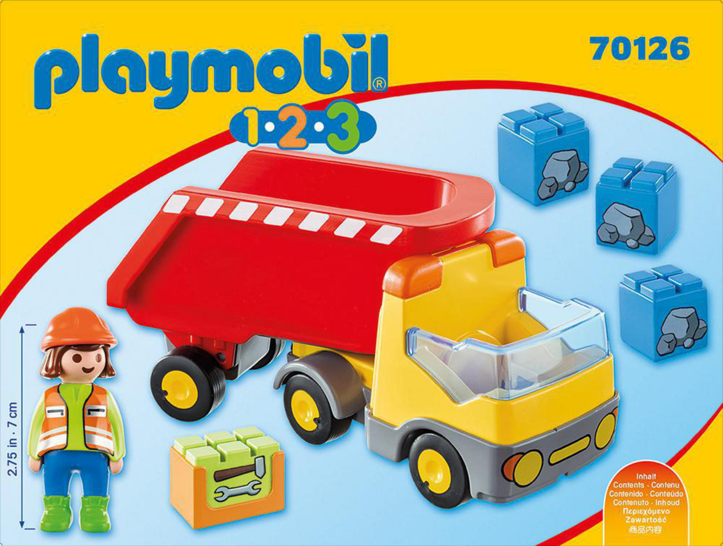 Playmobil-Spielzeugset, ein LKW mit Bauarbeiterfigur und Blöcken.