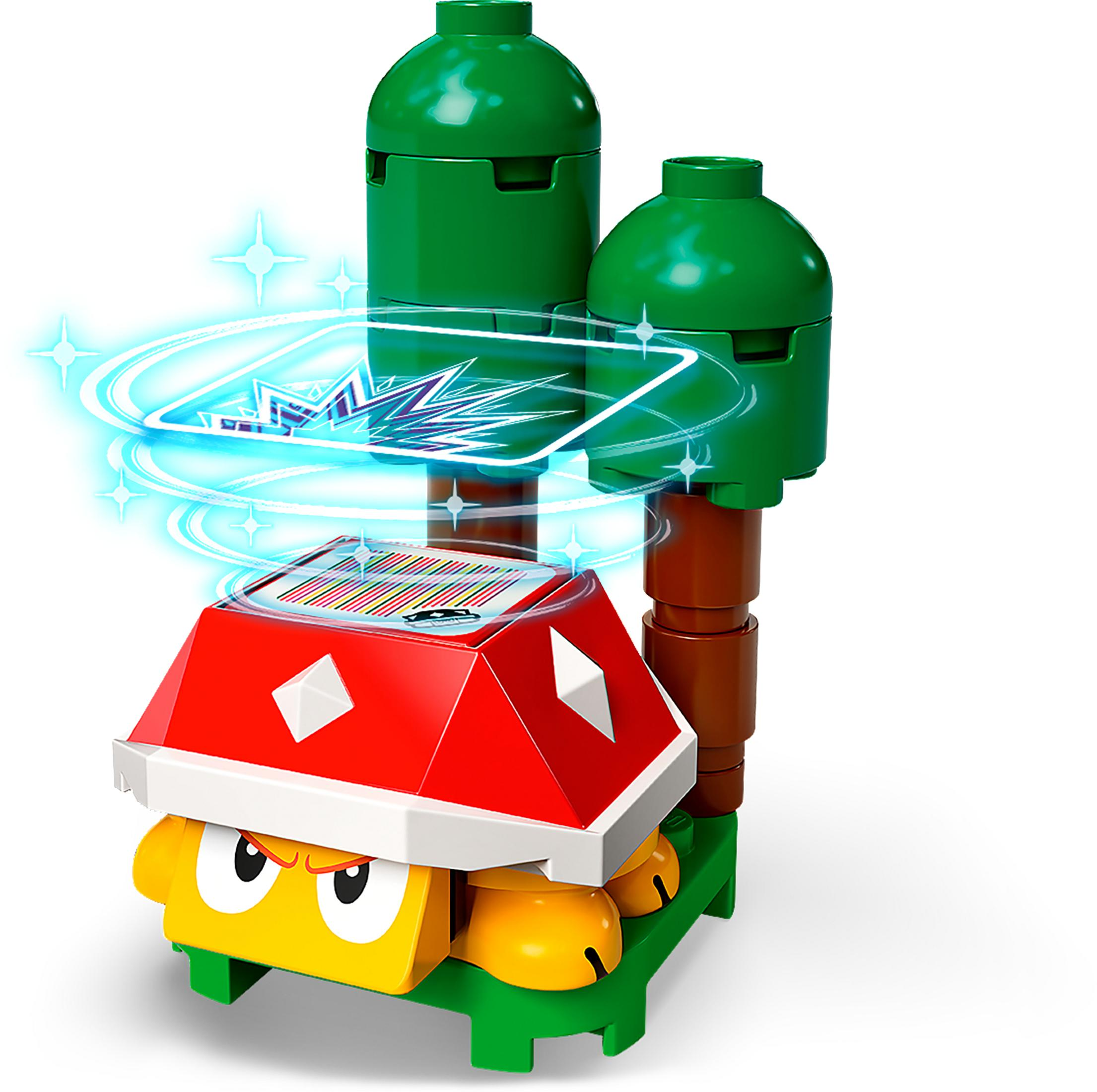 Nemico Lego Super Mario. Guscio rosso, faccia gialla. Base verde con due alberi.