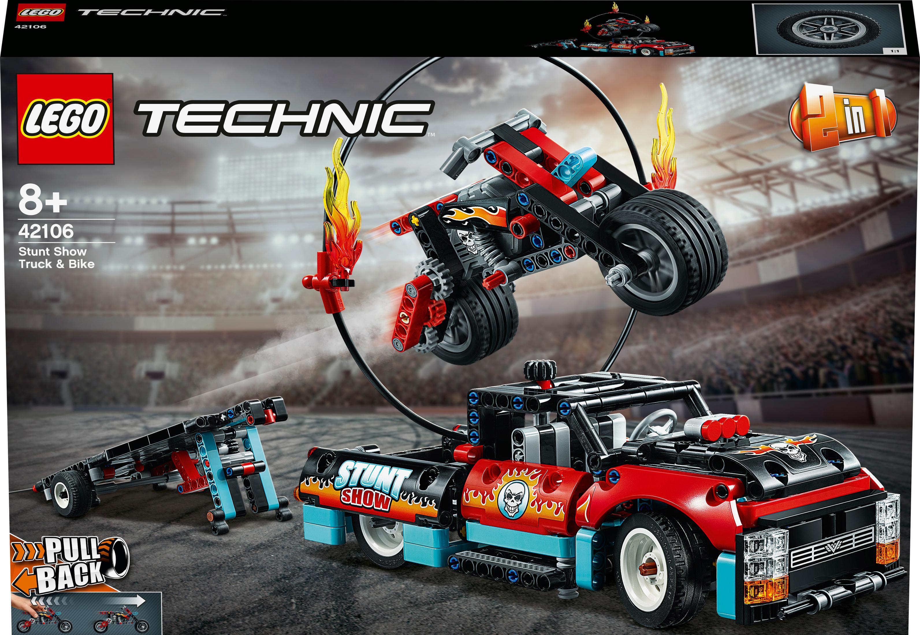 Ein Lego Technic Stunt Show Set mit einem Truck und einem Motorrad mit Flammen, vor farbenfrohem Hintergrund.