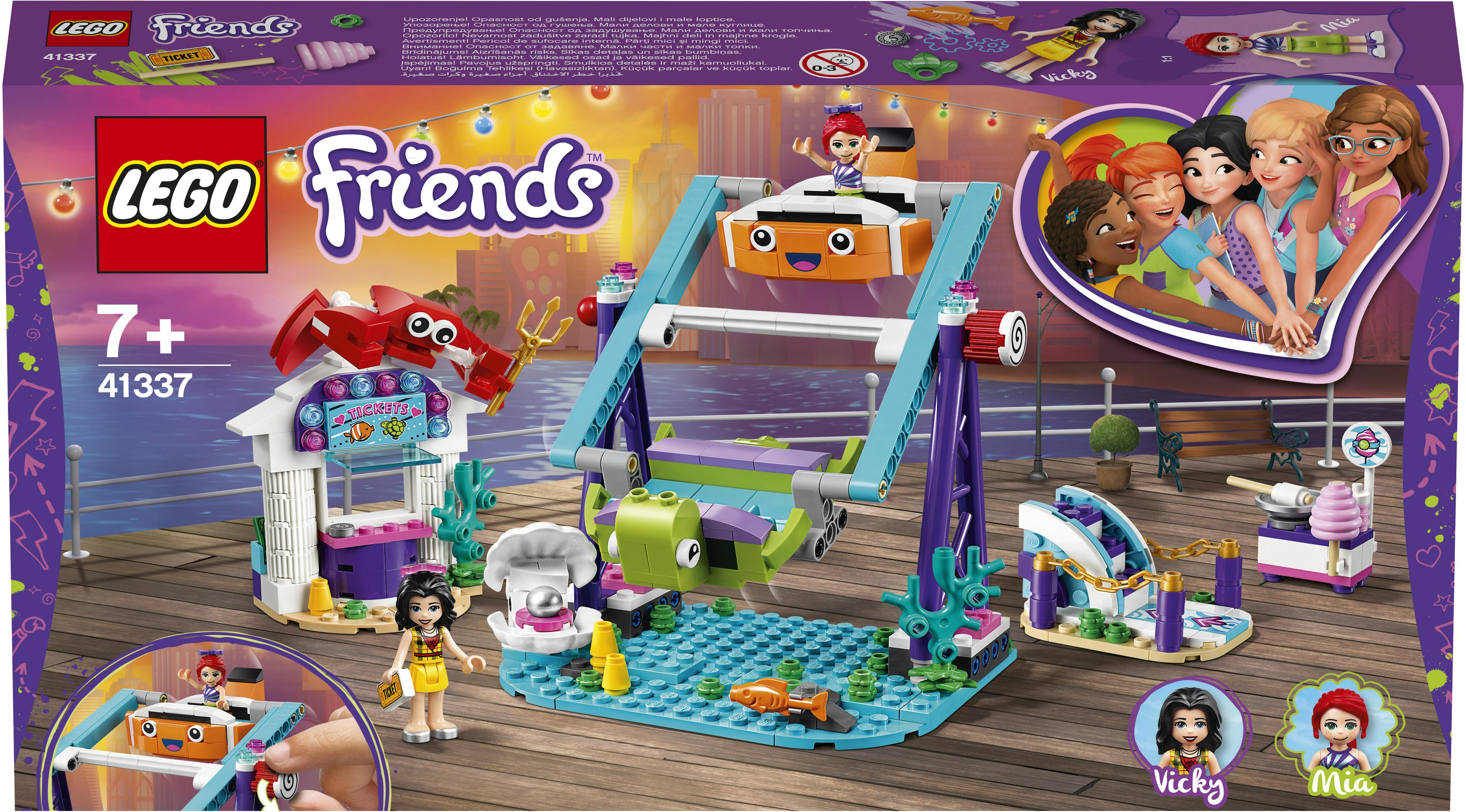 Eine Lego Friends Box mit einem Riesenrad, einem Krebsstand und anderen Elementen.