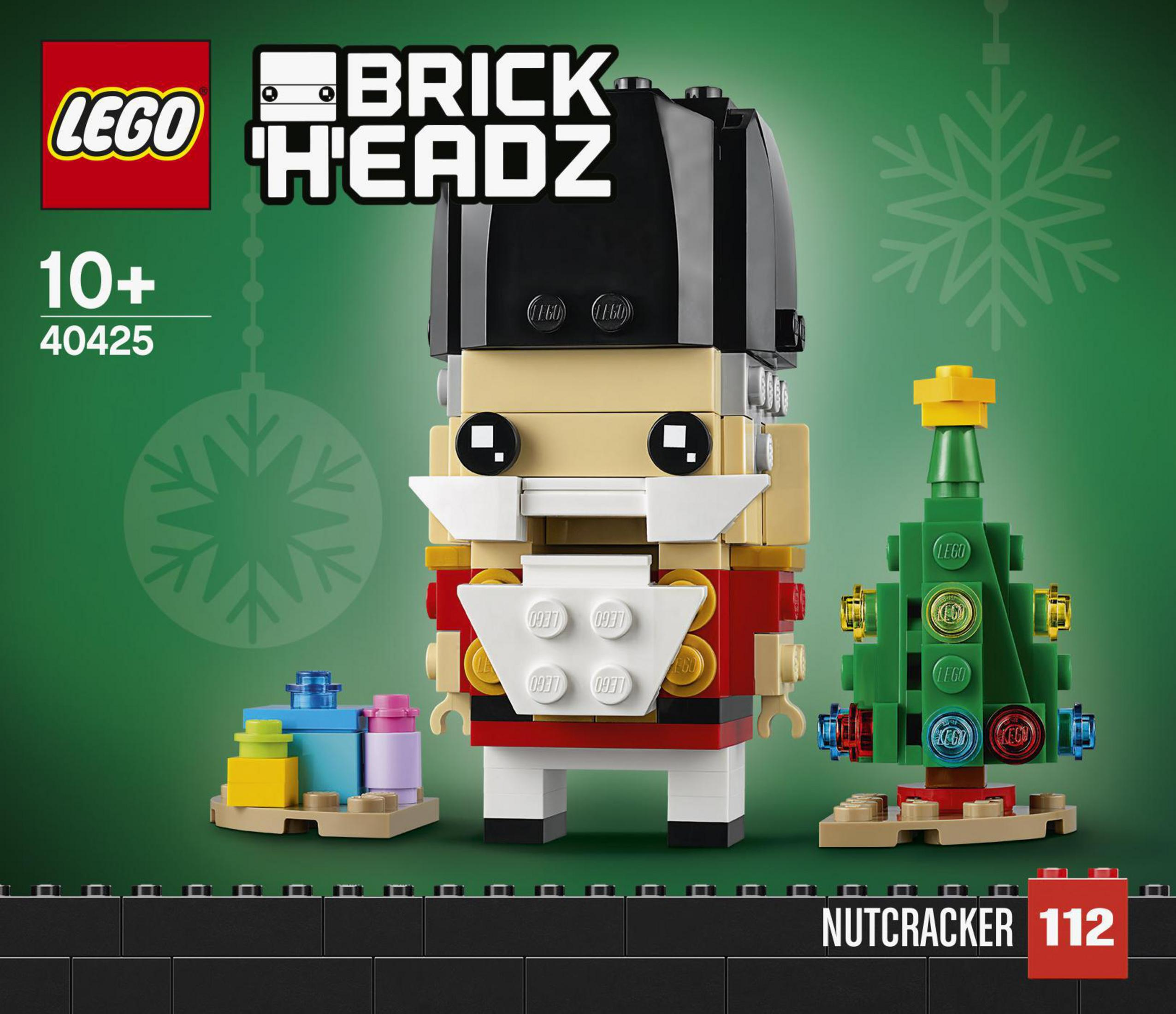 Lego BrickHeadz Nutcracker and Christmas tree, green background.
