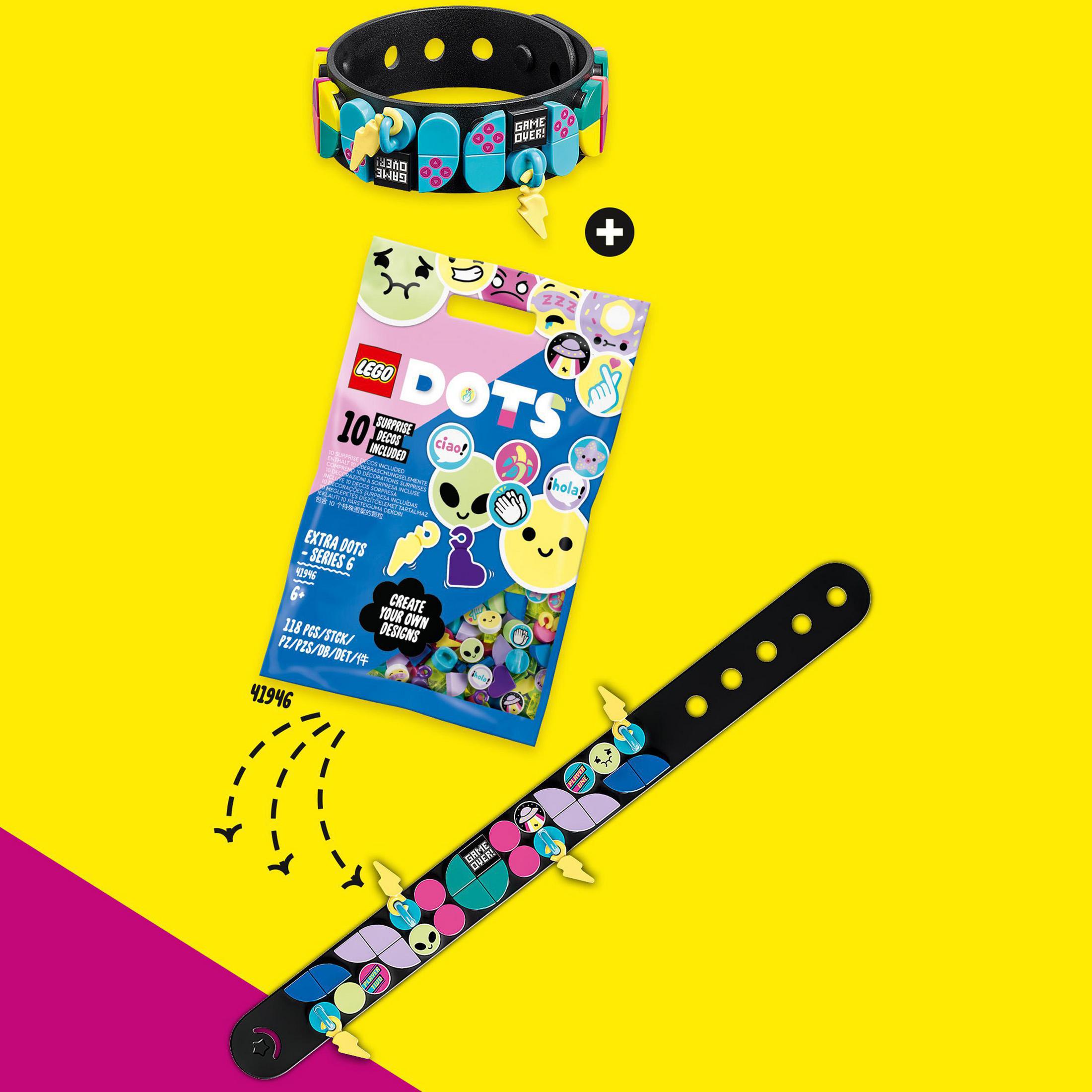 Lego Dots Set mit Armbändern und zusätzlichen Punkten. Enthält ein Armband und eine Tüte mit bunten Punkten.