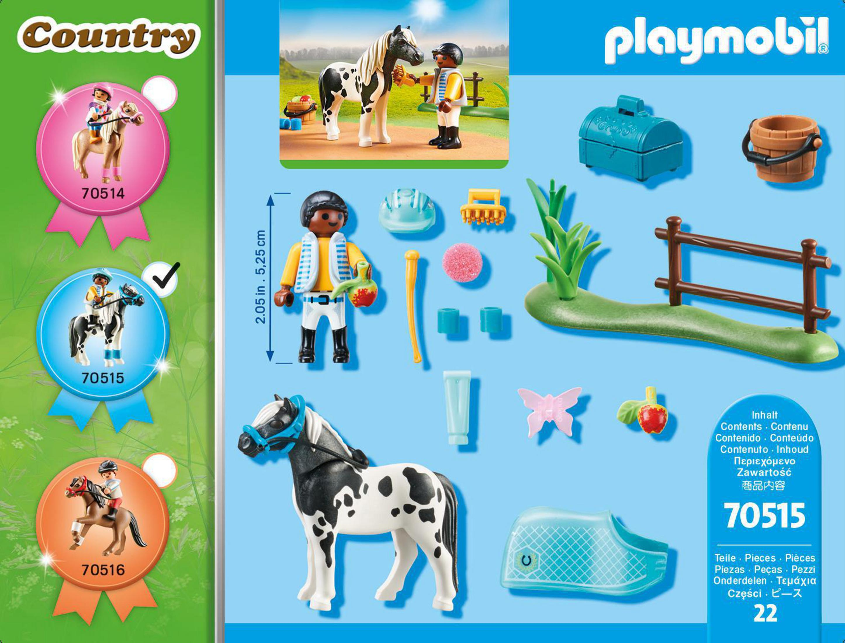 Playmobil-Box mit einem Spielzeugpferd und Reiter. Text und andere Spielzeugteile. Weißer Hintergrund.