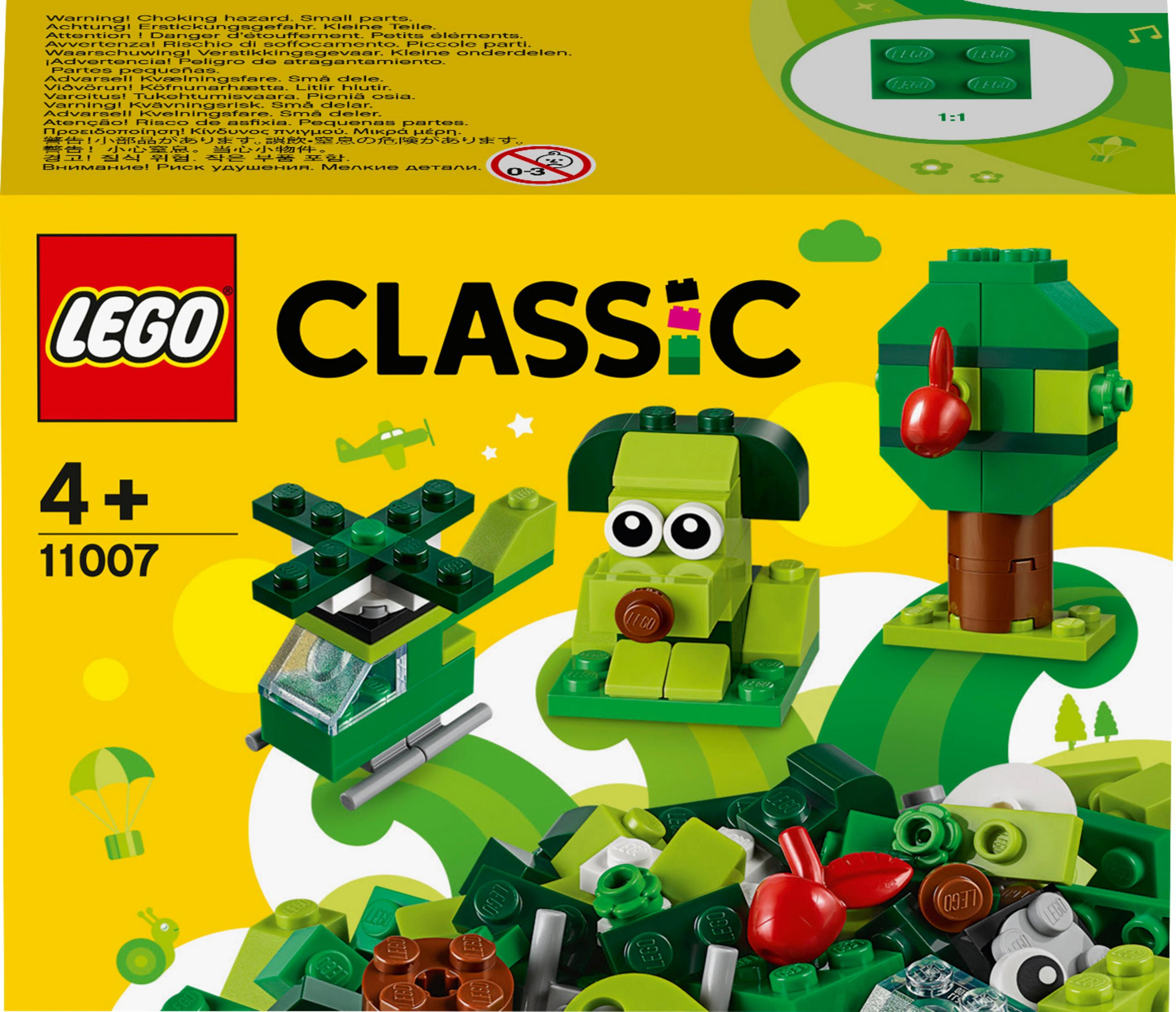 Una scatola Lego Classic con vari mattoncini Lego verdi.