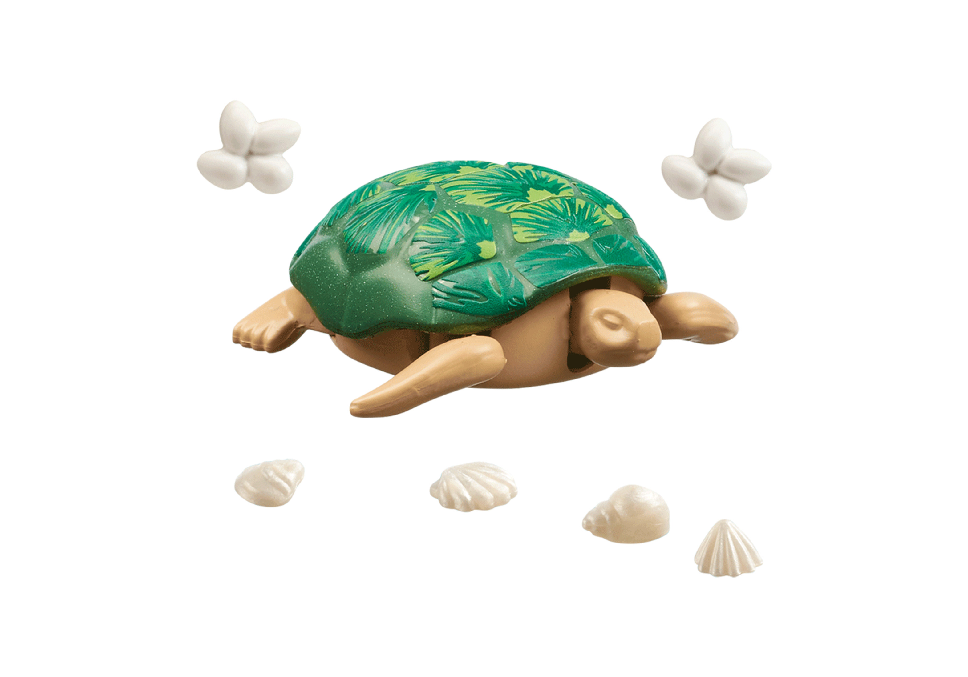 Schildkrötenspielzeug mit grünem Panzer, umgeben von Blumen- und Muscheldekorationen.