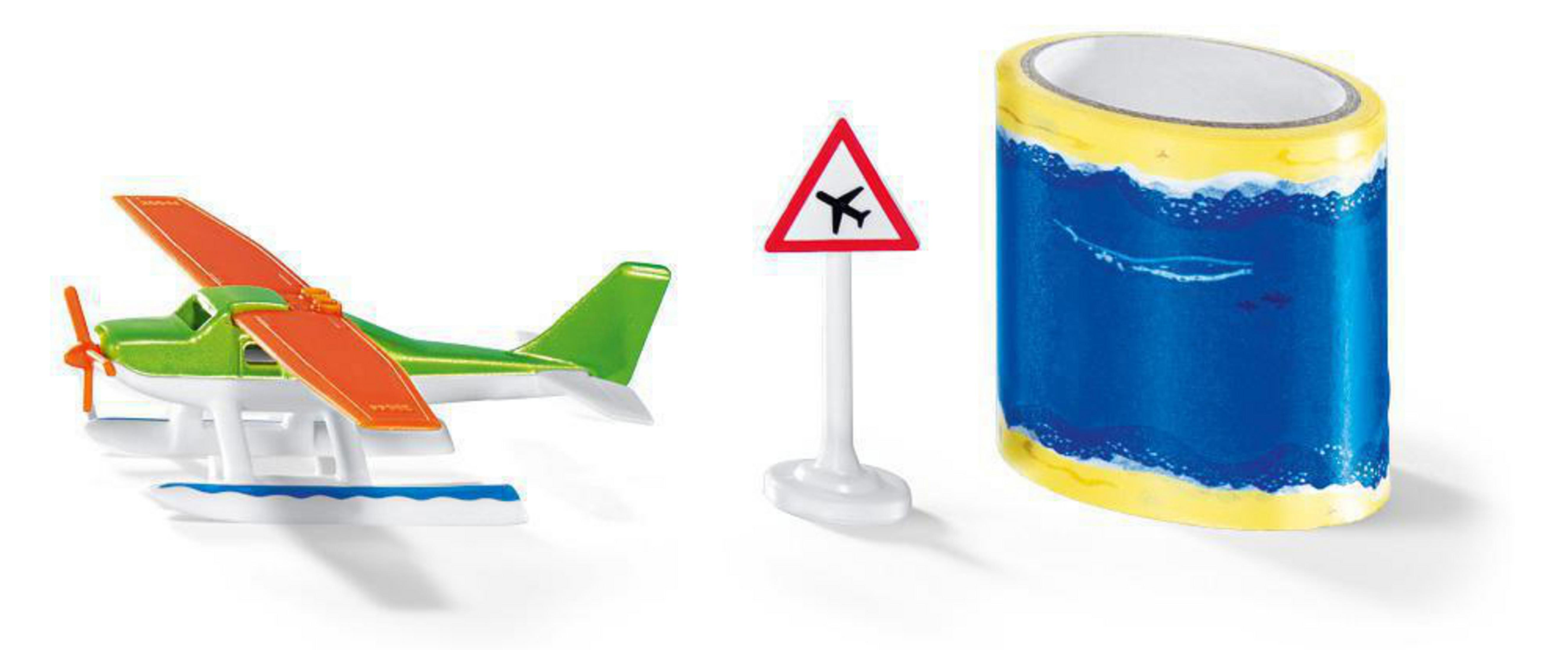 Ein grünes und orangefarbenes Wasserflugzeug, ein Flughafenschild und eine Rolle Klebeband mit blauem Ozean-Design.