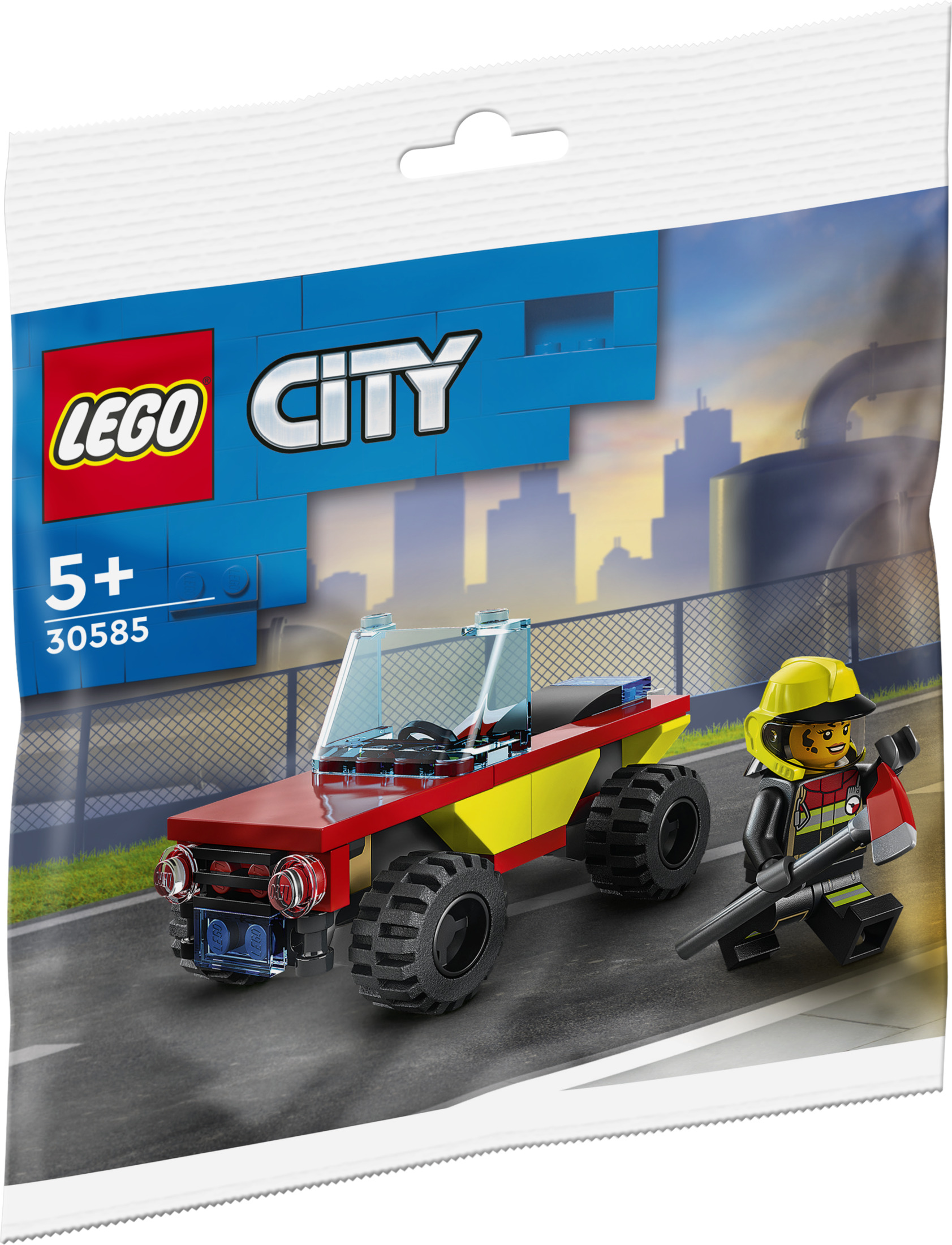 Zestaw Lego City: czerwono-żółta ciężarówka, strażak i tło krajobrazu miejskiego.