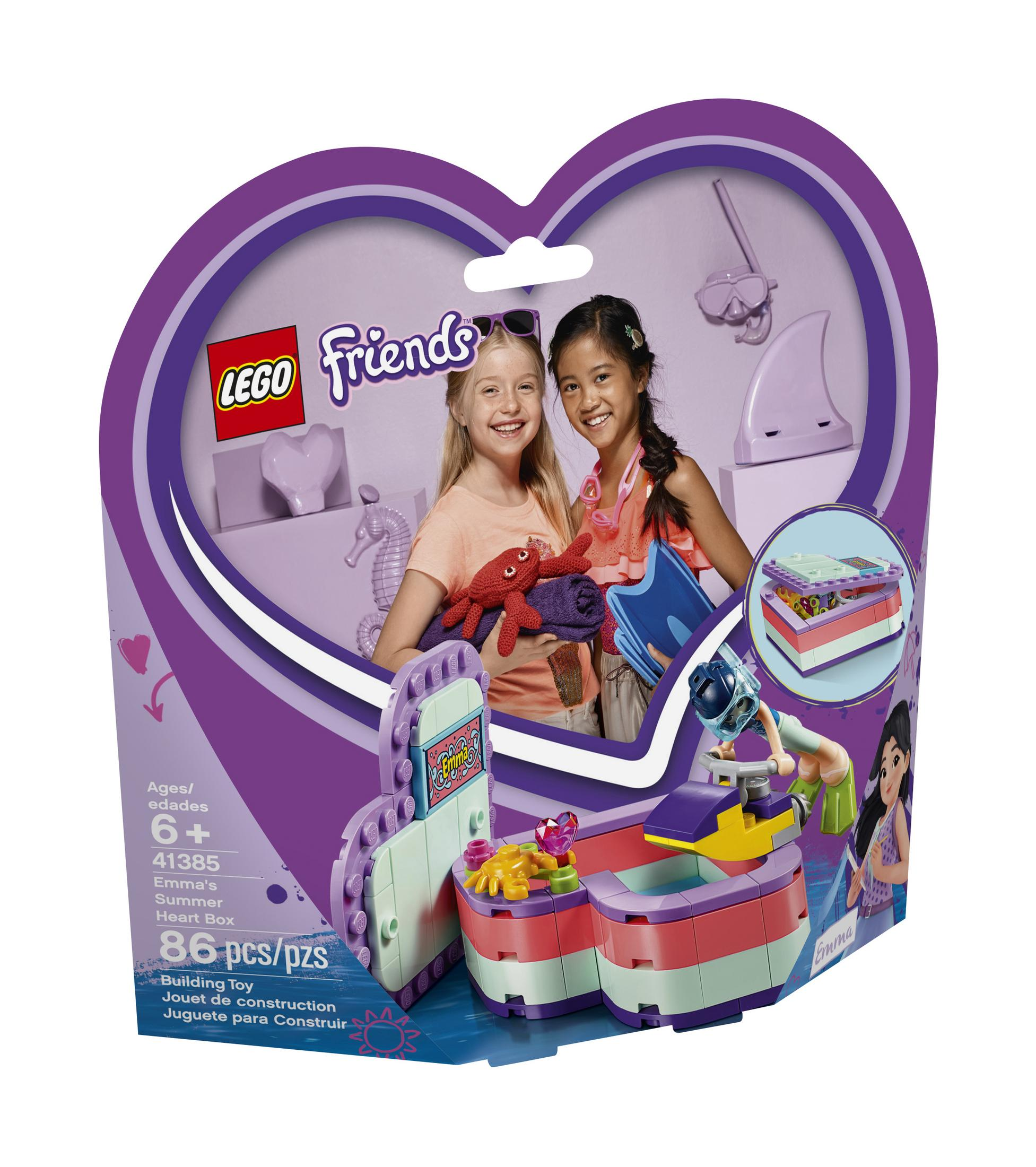 Eine Lego Friends Box mit zwei Mädchen und einem Lego-Set mit herzförmiger Verpackung.