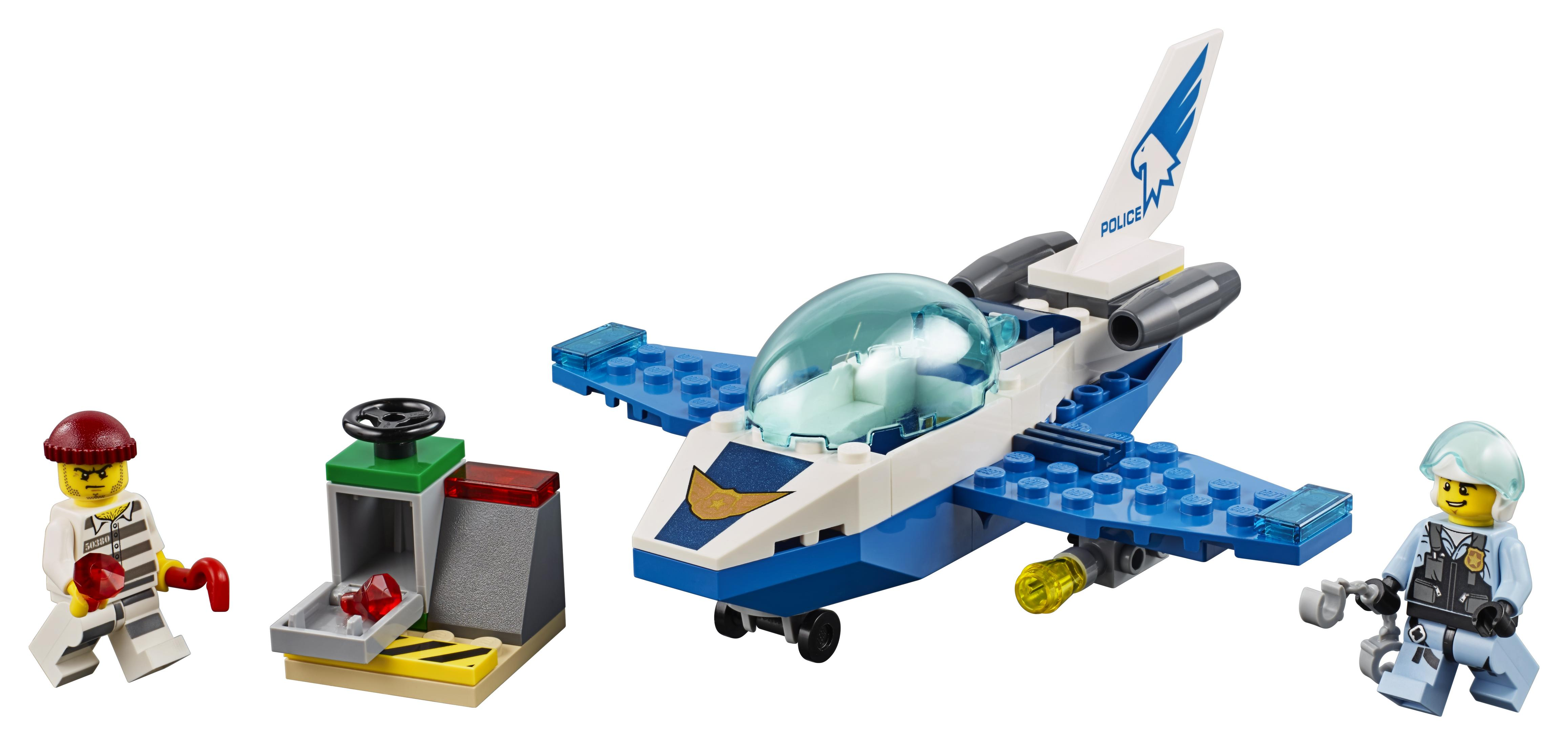 A Lego City police jet with two minifigures: a prisoner and a police officer. Also a jail cell.