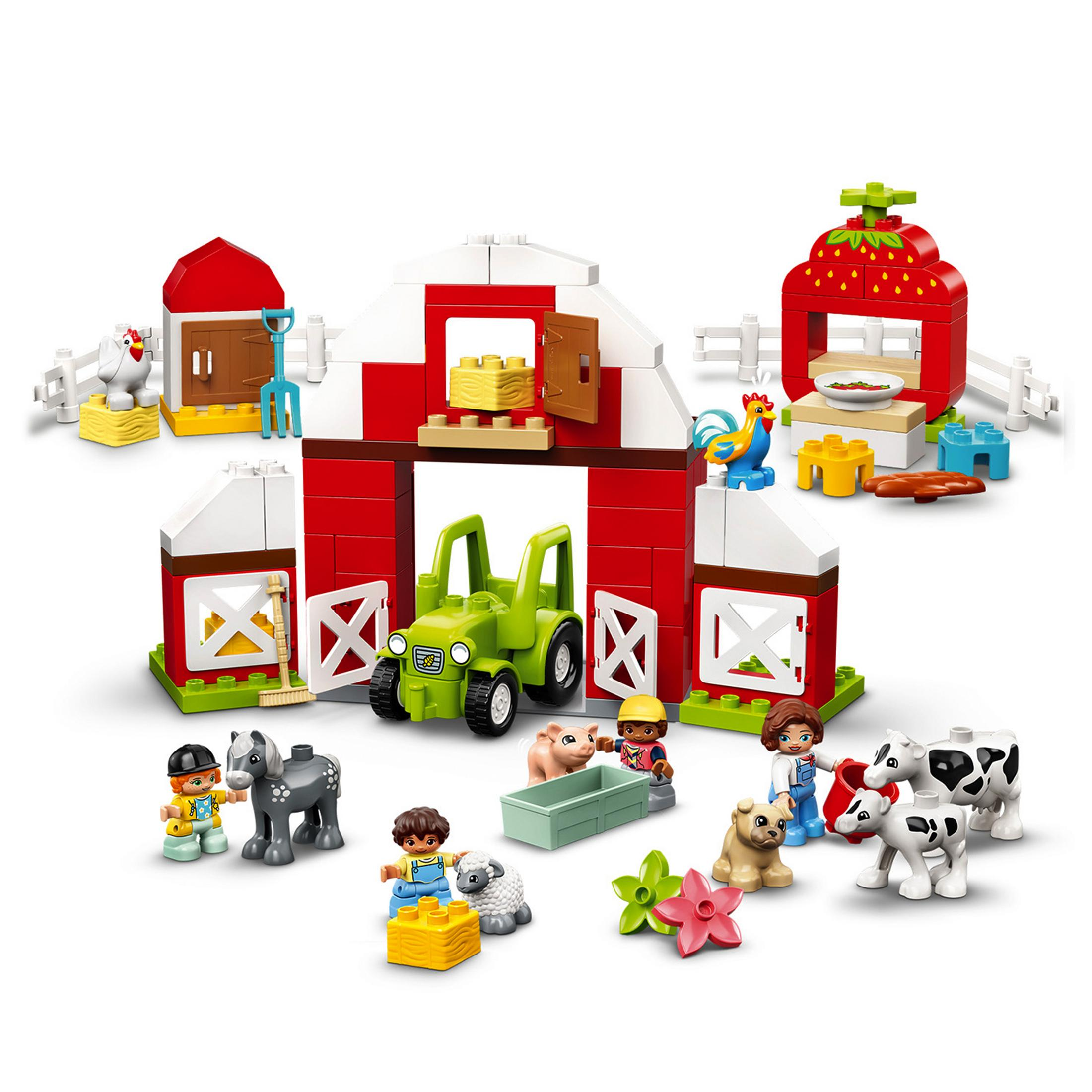 Ein Lego-Bauernhof-Set mit roter Scheune, Traktor, Tieren und Minifiguren.
