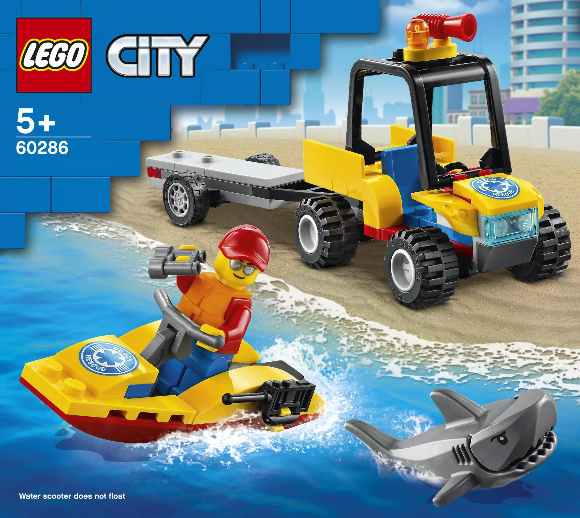Set LEGO City con un veicolo di soccorso, una moto d'acqua e uno squalo in acqua. Mare blu.