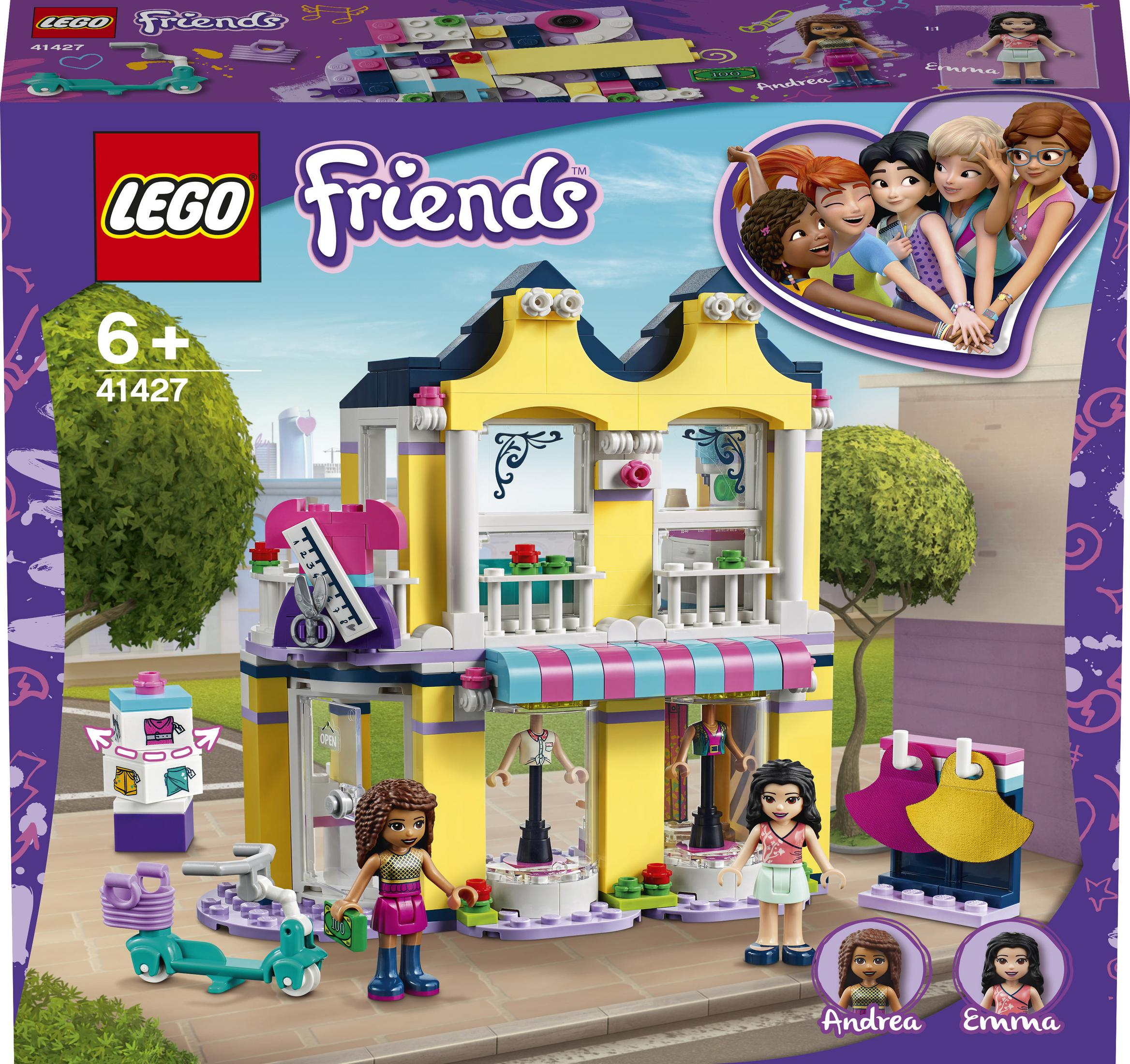 Lego Friends-Set. Eine gelbe Ladenfront mit Andrea- und Emma-Figuren. Ein Roller und Zubehör sind im Vordergrund.