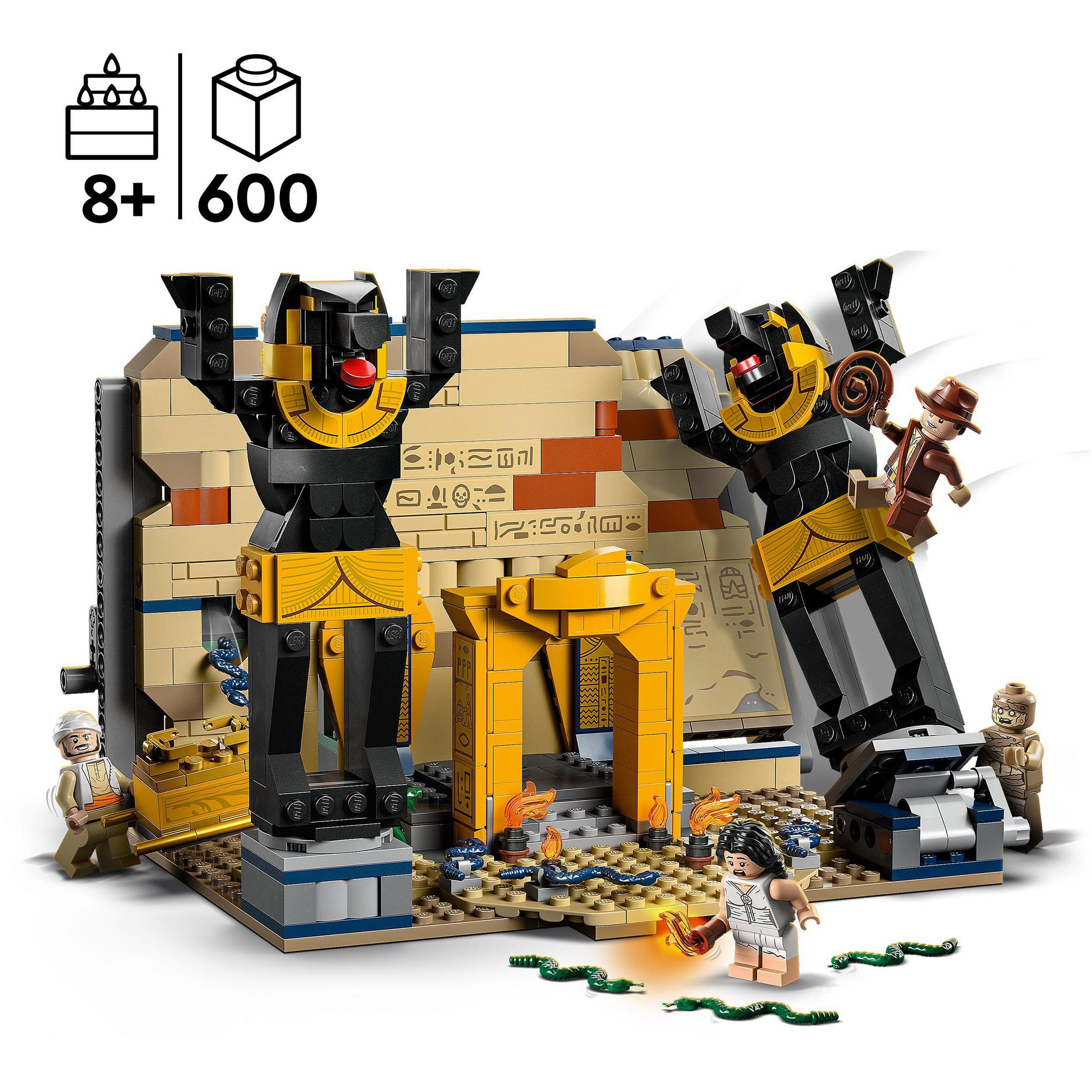 Un set LEGO che mostra un tempio egizio con statue e minifigure di esploratori e guardie.