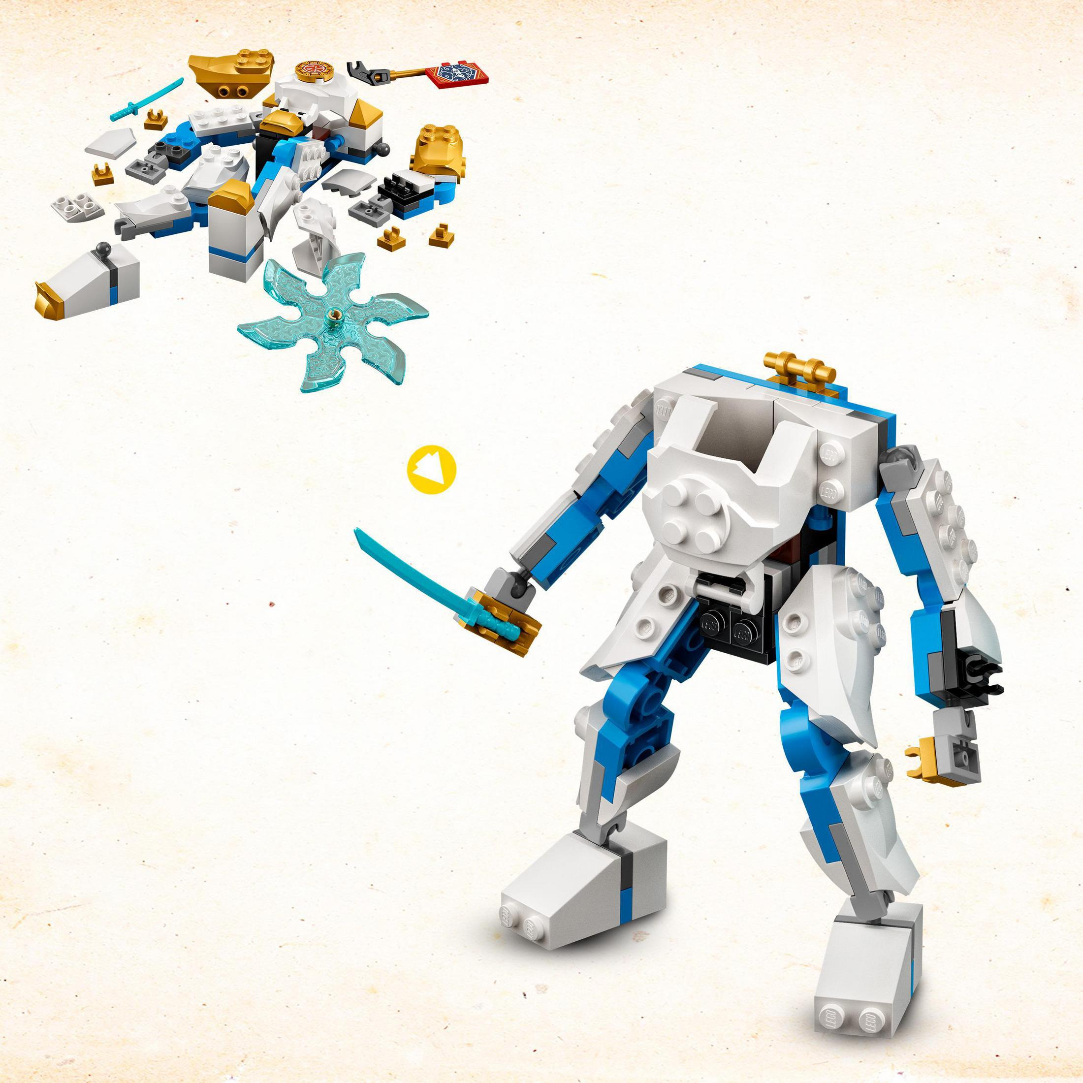 Una figura di robot giocattolo parzialmente costruita, realizzata con componenti bianchi, blu e oro.
