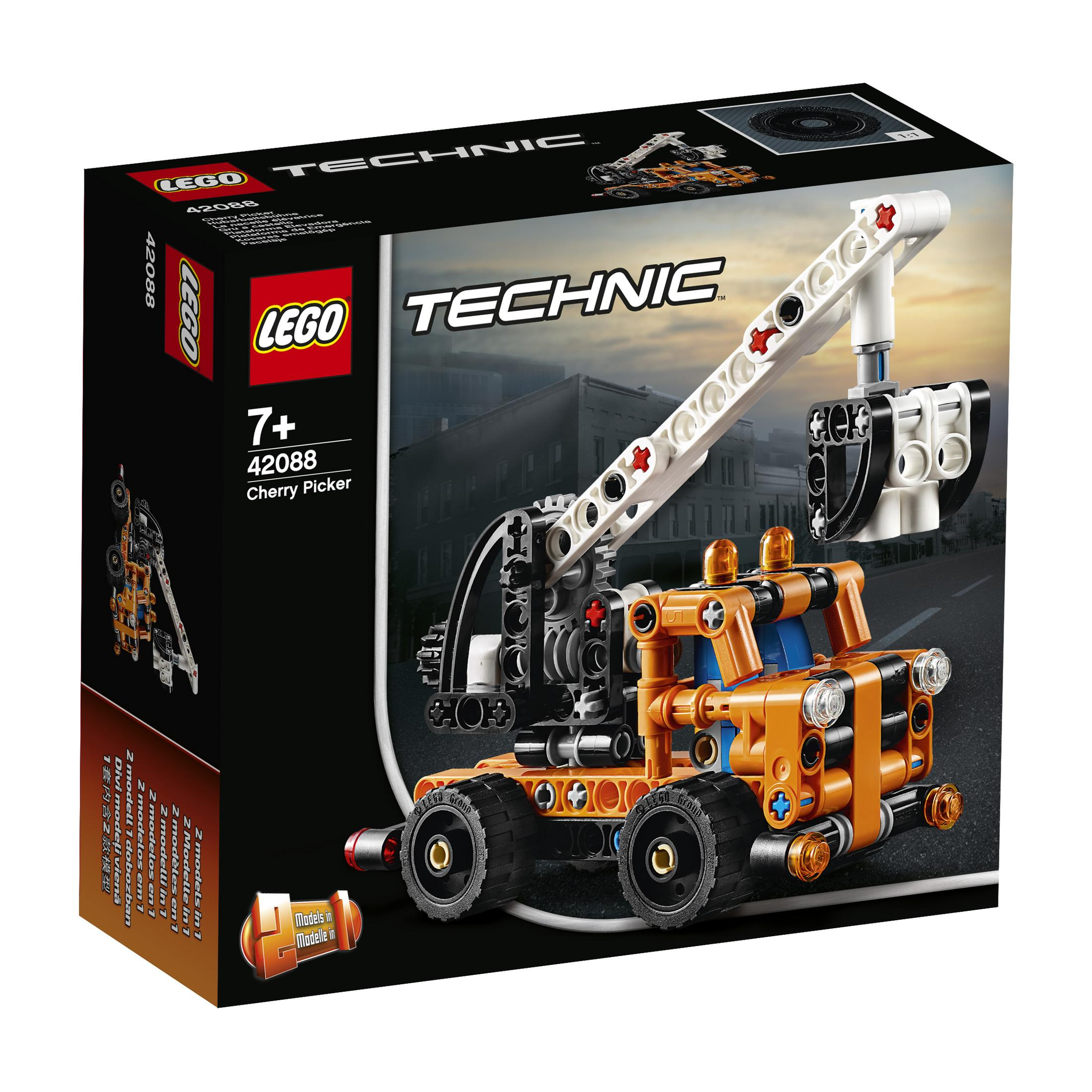 Lego Technic Cherry Picker set. Orange and black toy with a crane. Box shows the scene.
