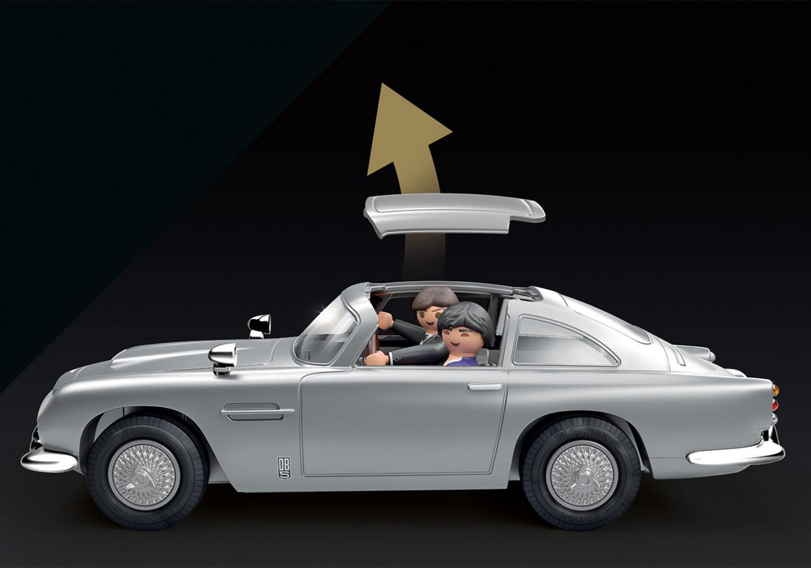 Silver car with two figures inside and an arrow pointing upwards.