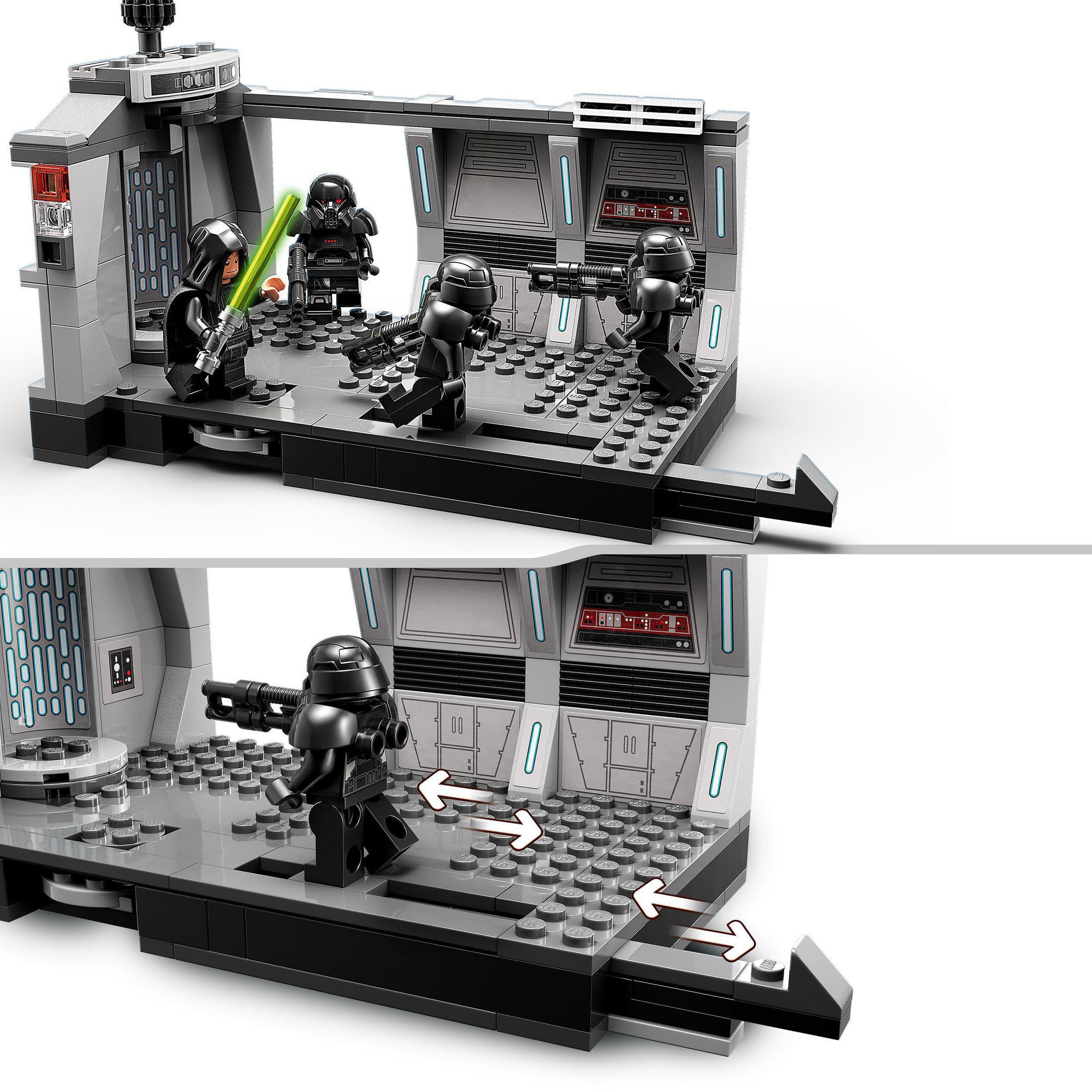 Lego Star Wars Set mit schwarzen Figuren in einem grauen Innenraum. Ein Lichtschwert ist sichtbar.