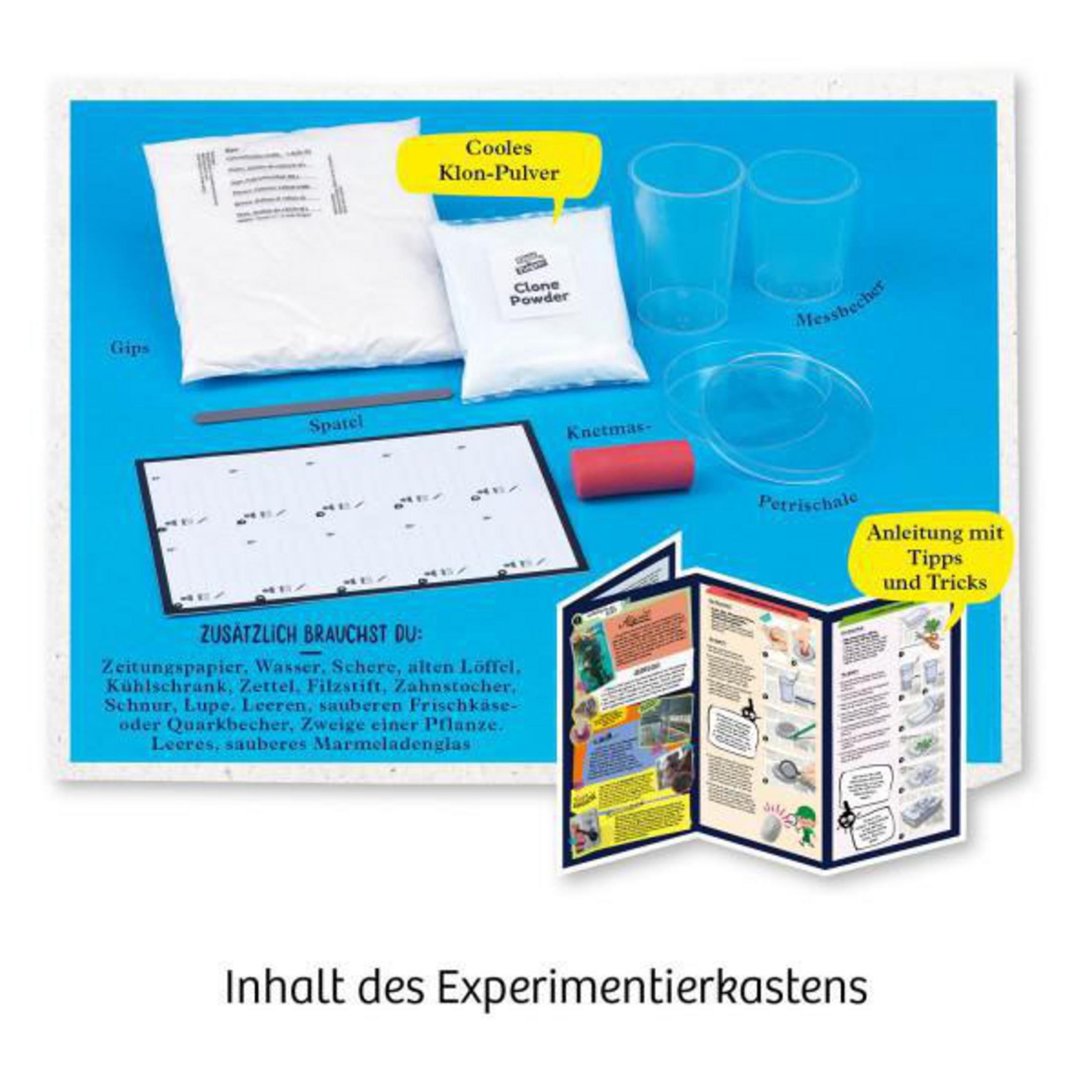 Ein wissenschaftliches Experimentier-Set mit Gegenständen wie Bechergläsern, Pulver und Anleitungen.