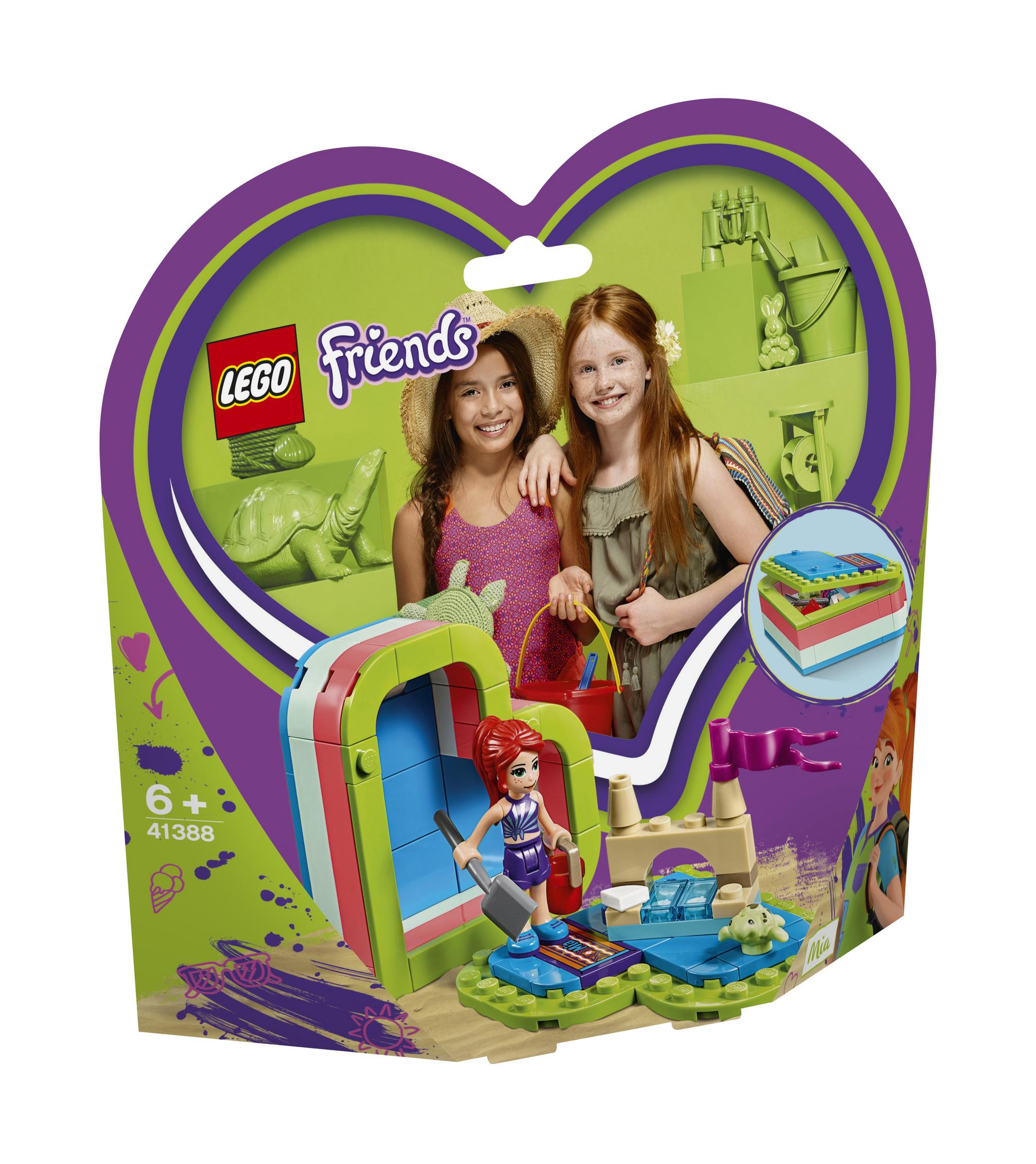 Pudełko zestawu Lego Friends z dwiema dziewczynami i sceną plaży i parku wodnego.