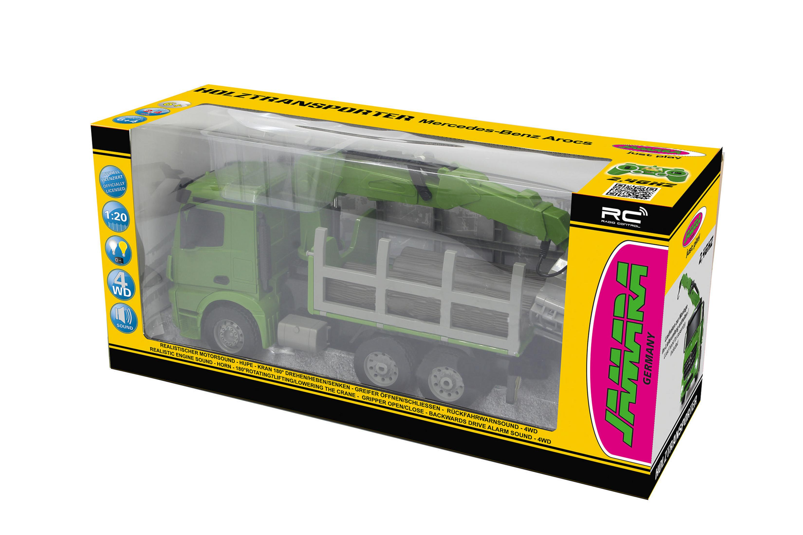 Ein Spielzeug-LKW in einer Box. Der LKW ist grün mit einem Kran, und die Box zeigt die Marke und ein Mercedes-Logo.