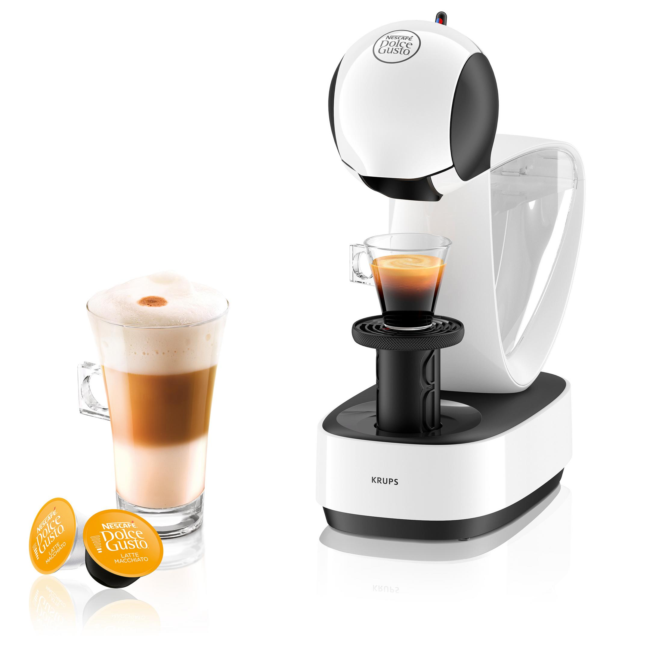 Eine weiß-schwarze Krups Kaffeemaschine mit Latte Macchiato und zwei Kaffeepads.