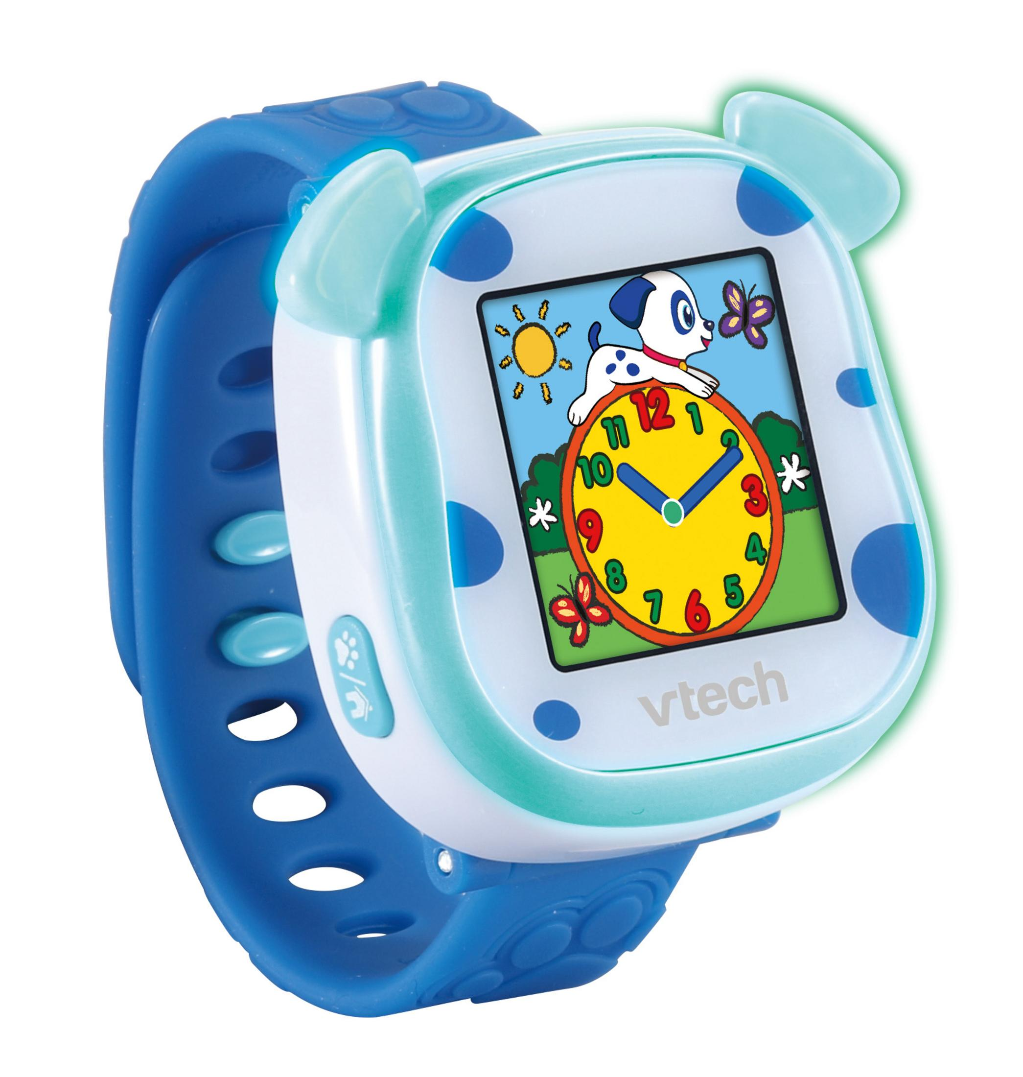 Eine blaue VTech-Uhr mit einem Cartoon-Hund auf dem Bildschirm, der die Uhrzeit anzeigt. Blaue Tupfen auf der Uhr.