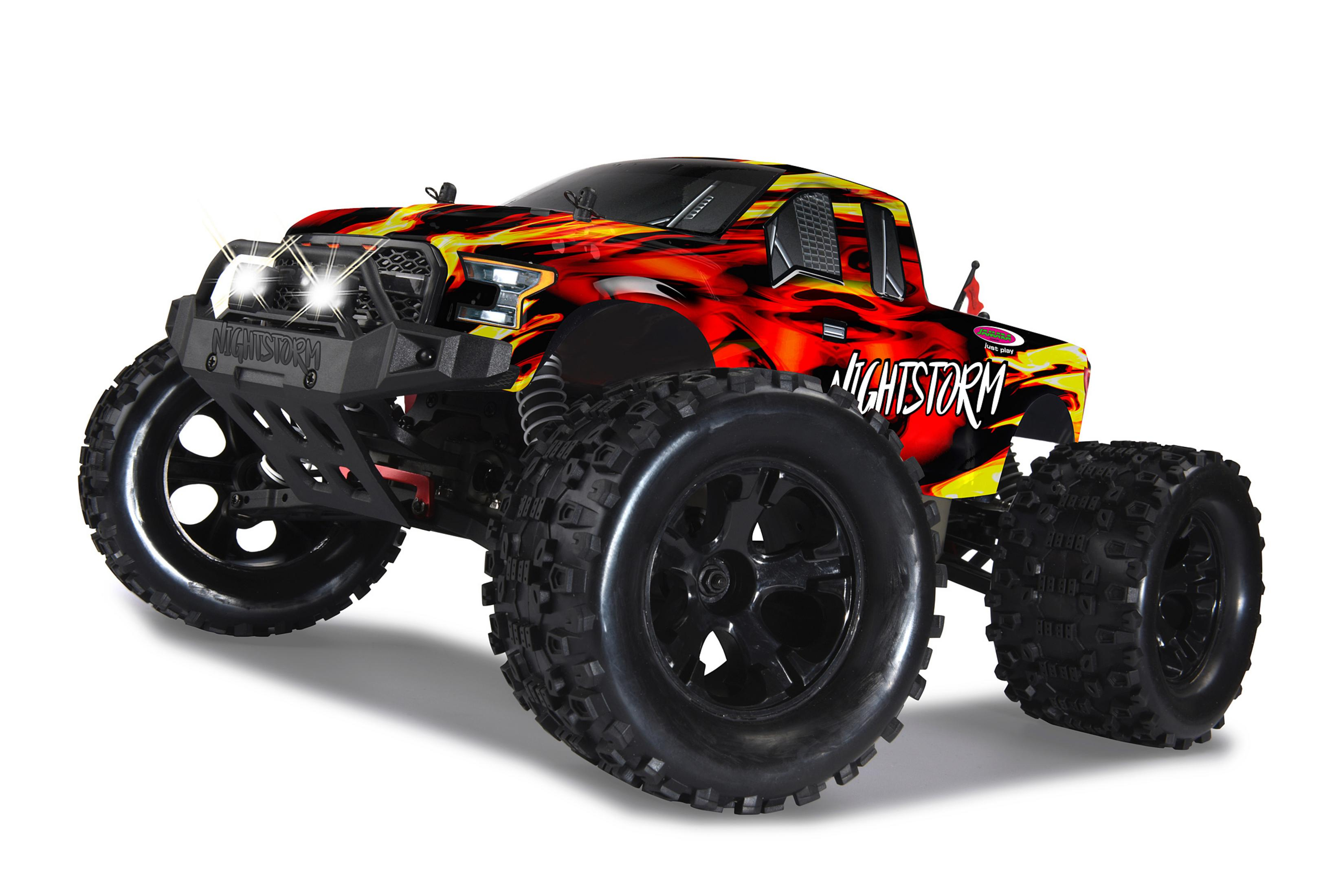 Ein großer, ferngesteuerter Monstertruck mit Flammendesign auf weißem Hintergrund.